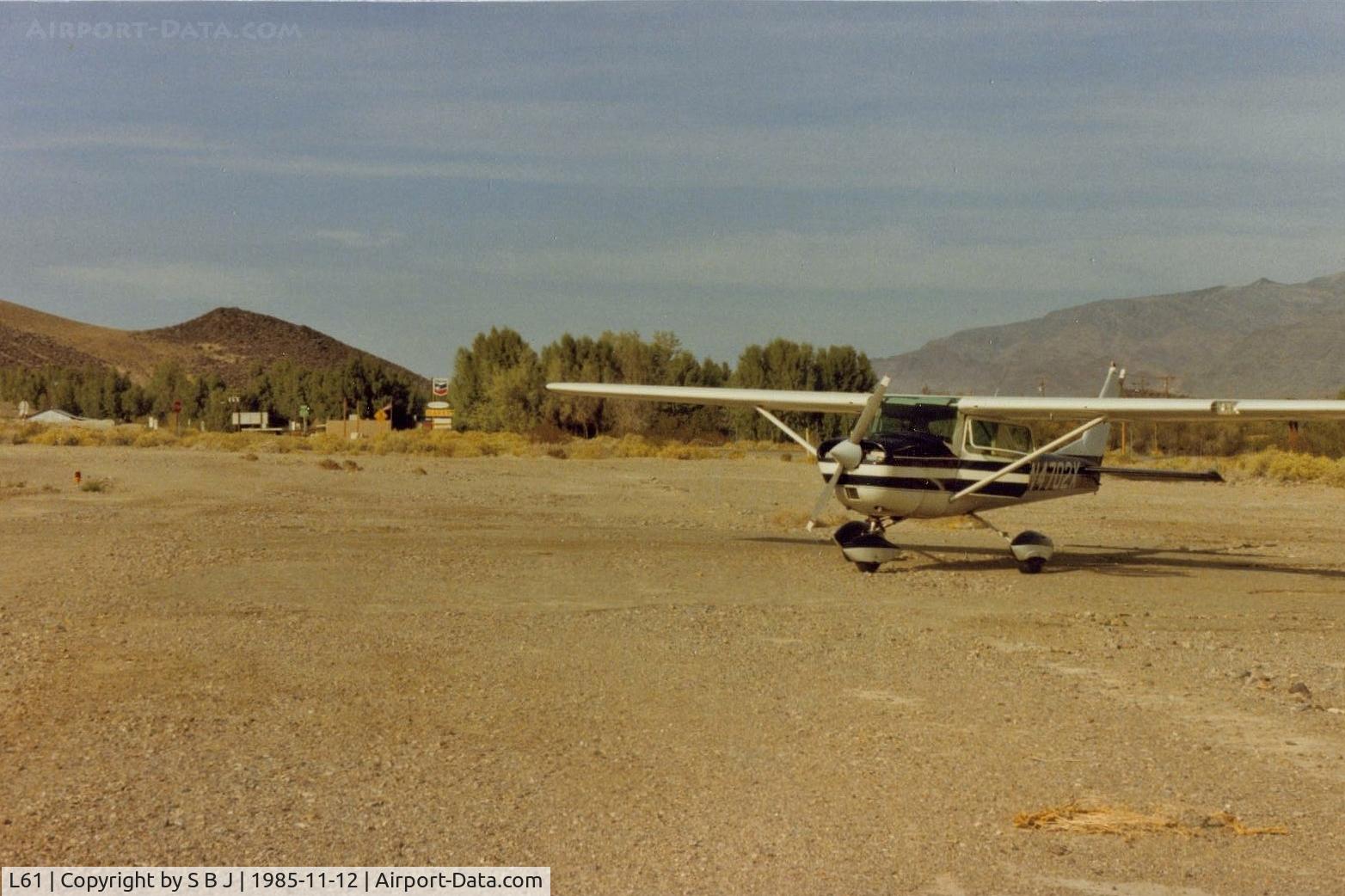 Shoshone Airport (L61) - 02x at Shoshone showing the short distance to town and the trees that you fly over on short final if landing on runway 15.Runway 33 is upslope with obstructions so a go around can be problematic.Was a fatal acc on a go around on 8-18-73.