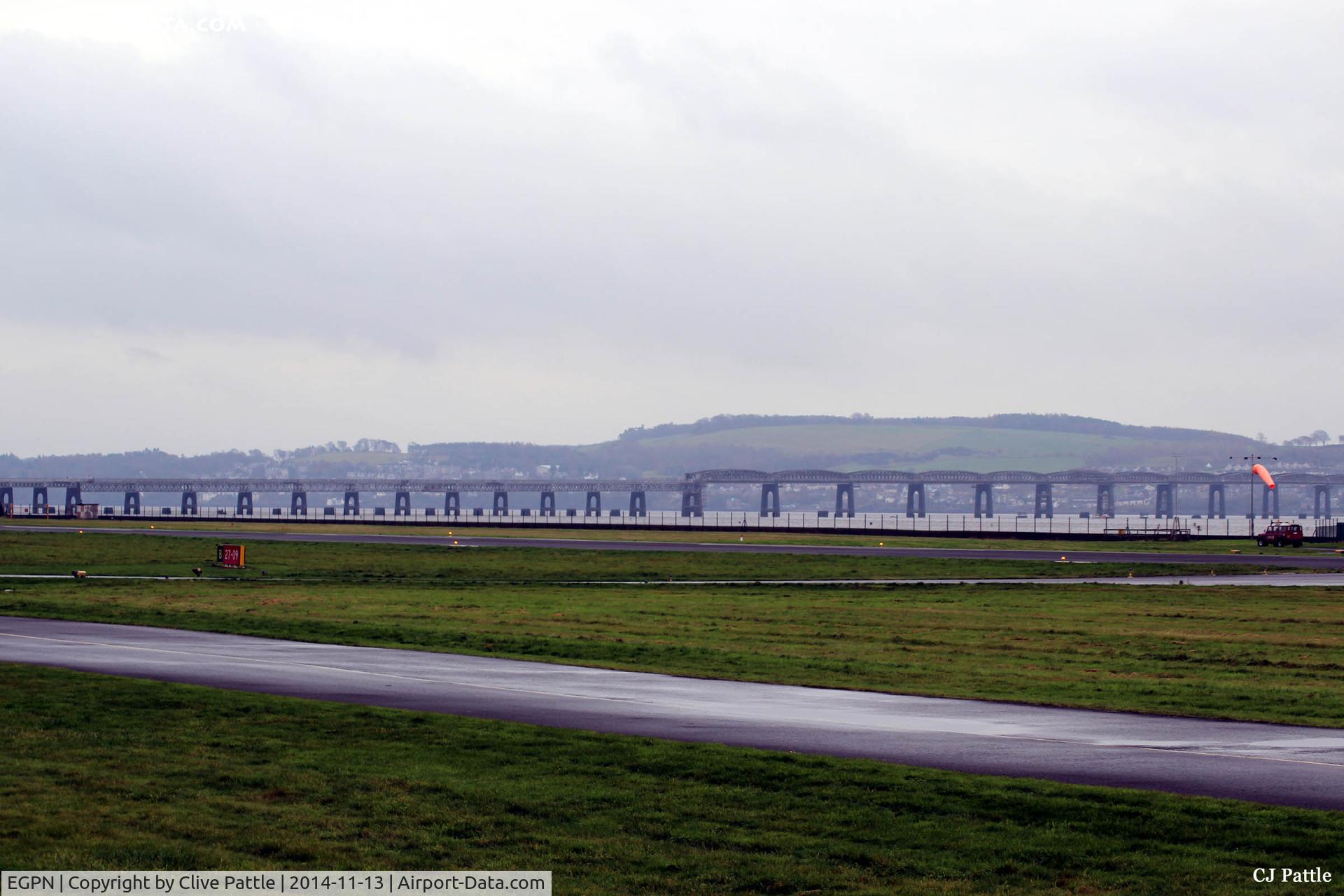 Dundee Airport, Dundee, Scotland United Kingdom (EGPN) - Uncluttered view looking south east across the airfield at Dundee Riverside, towards the Tay Rail Bridge and the Kingdom of Fife beyond.