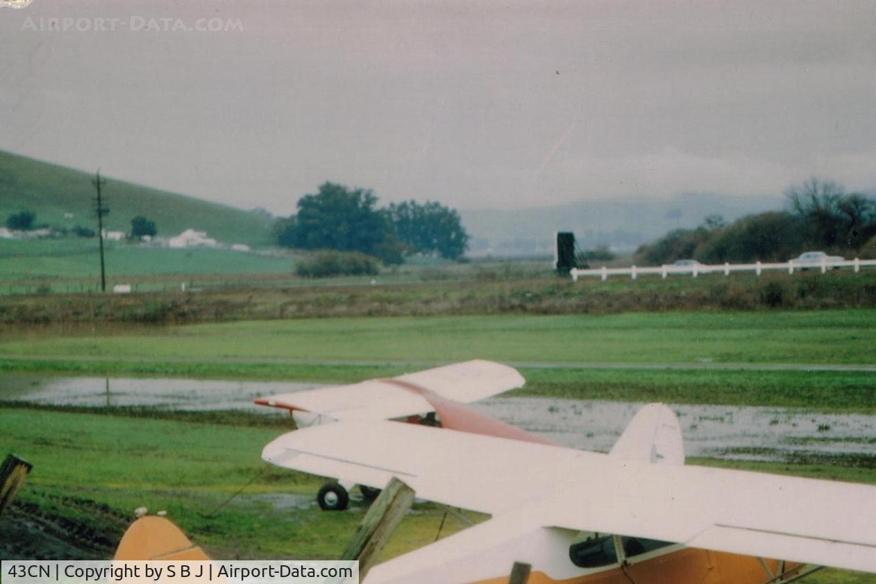 Mazza Airport (43CN) - Private strip a few miles NW of Gnoss (DVO).Was a demanding ( narrow & elevated ) runway that was a  one way strip (power lines) for low power planes when I landed there in 1990. View is to the NE. Cars are on Hy 101.