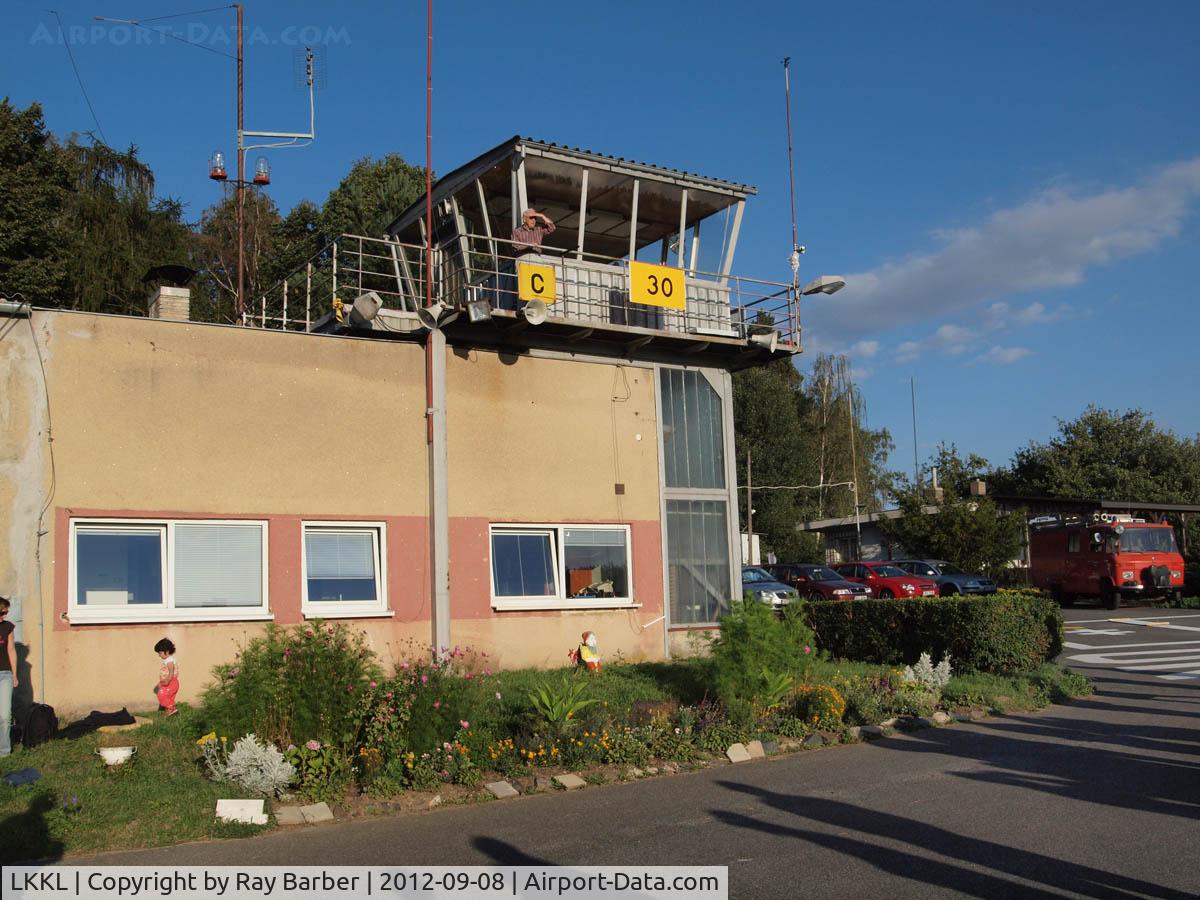 Kladno Airport, Kladno Czech Republic (LKKL) - Showing tower and car park including fire service vehicle.