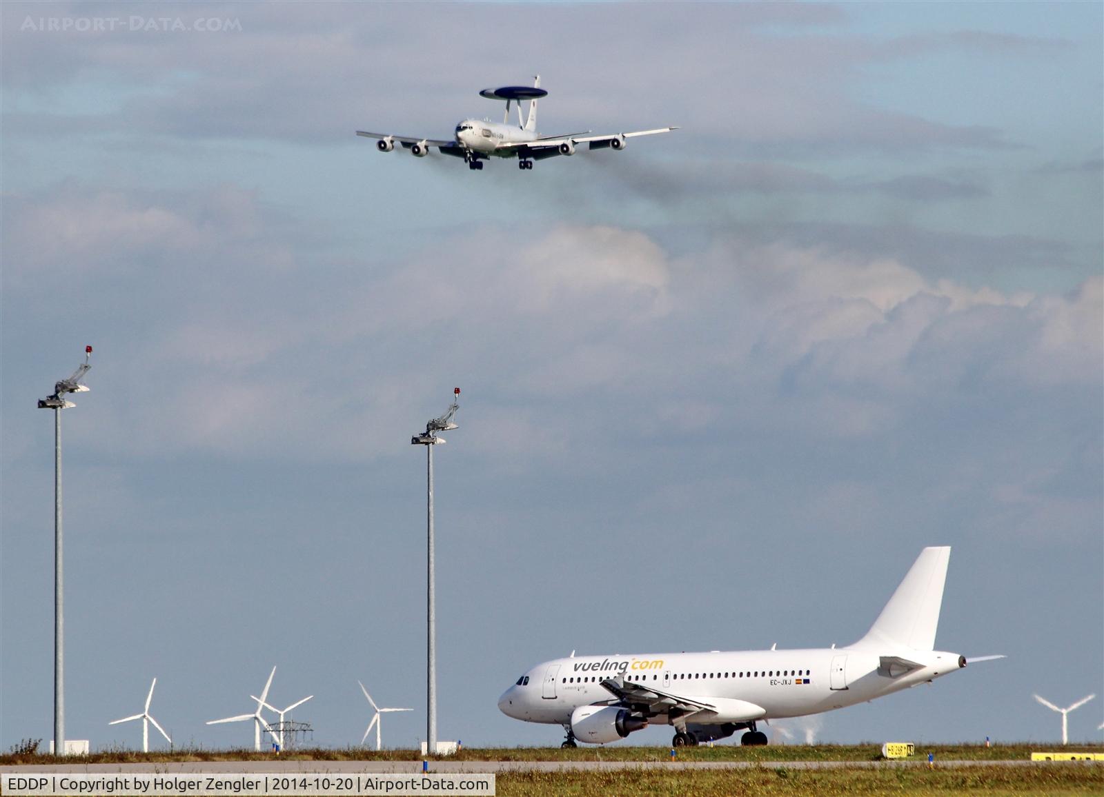 Leipzig/Halle Airport, Leipzig/Halle Germany (EDDP) - Outgoing traffic on twy A8 is observing AWACS-707 on final for rwy 26R.....