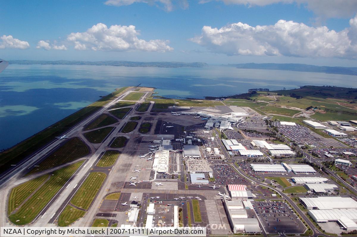 Auckland International Airport, Auckland New Zealand (NZAA) - Enormous amount of aircraft in this photo (taken from DC-3 ZK-DAK)
