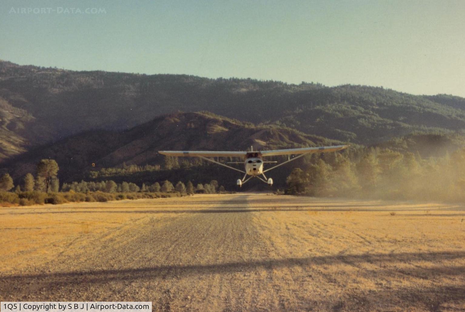 Gravelly Valley Airport (1Q5) - View is down runway and to the north.42E is seen departing in the best direction toward the lake. Keep in mind that prop damage (with some tricycle planes) is possible due to gravel runway.