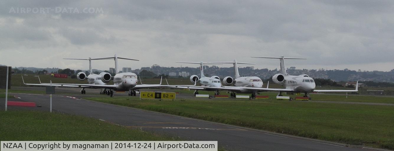 Auckland International Airport, Auckland New Zealand (NZAA) - Christmas parking lot!! N755RA / N300K /
 VP-CJC / VP-CTE / VP-CET