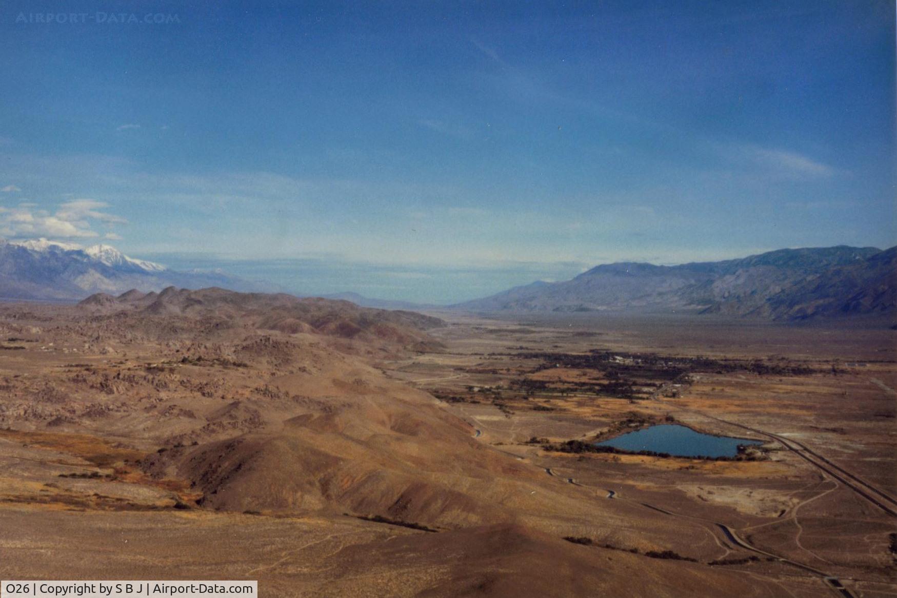 Lone Pine Airport (O26) - Lone Pine which is on the south side and almost in the small town so it is hard to see. Runway is at the extreme right of pic. View is north.Excellent glider country. 