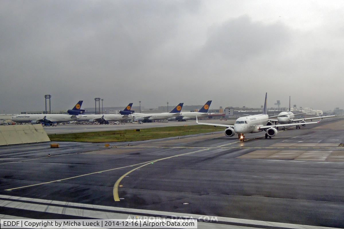 Frankfurt International Airport, Frankfurt am Main Germany (EDDF) - A look back at LH's base while we are lining up on runway 