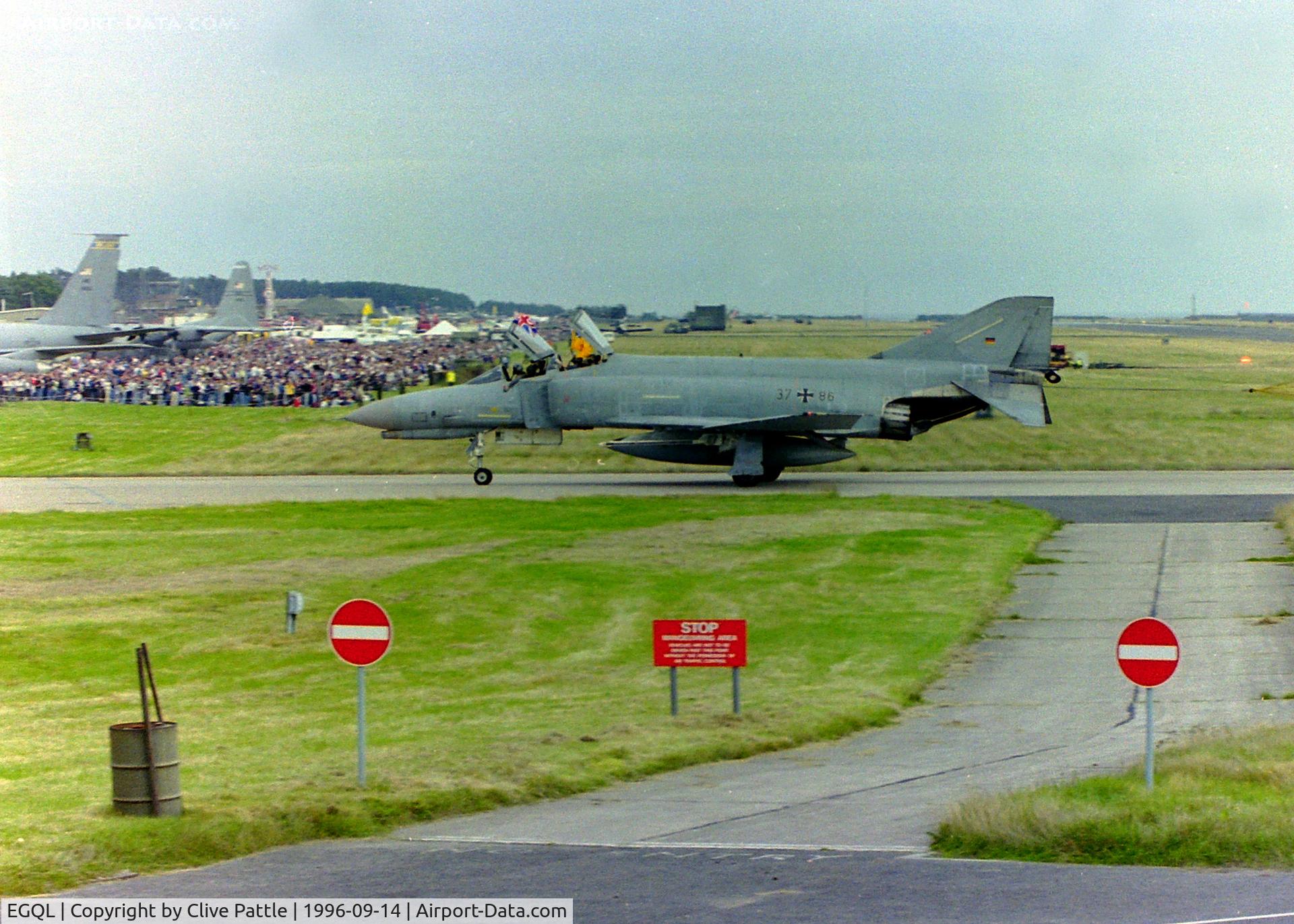 RAF Leuchars Airport, Leuchars, Scotland United Kingdom (EGQL) - Posted to primarily show a shot of the crowd line at a Leuchars Airshow. A sight that will be seen no more with the imminent closure as an airbase approaching fast (Mar '15). Taken at the 1996 airshow as a Luftwaffe Phantom F4F taxies in after a display.
