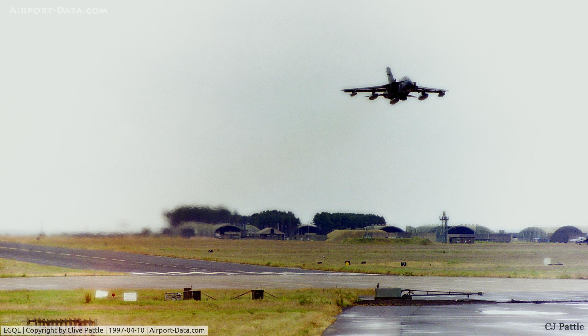 RAF Leuchars Airport, Leuchars, Scotland United Kingdom (EGQL) - A Tornado GR.4 over the airbase at RAF Leuchars with the 111 Sqn buildings in the background.
