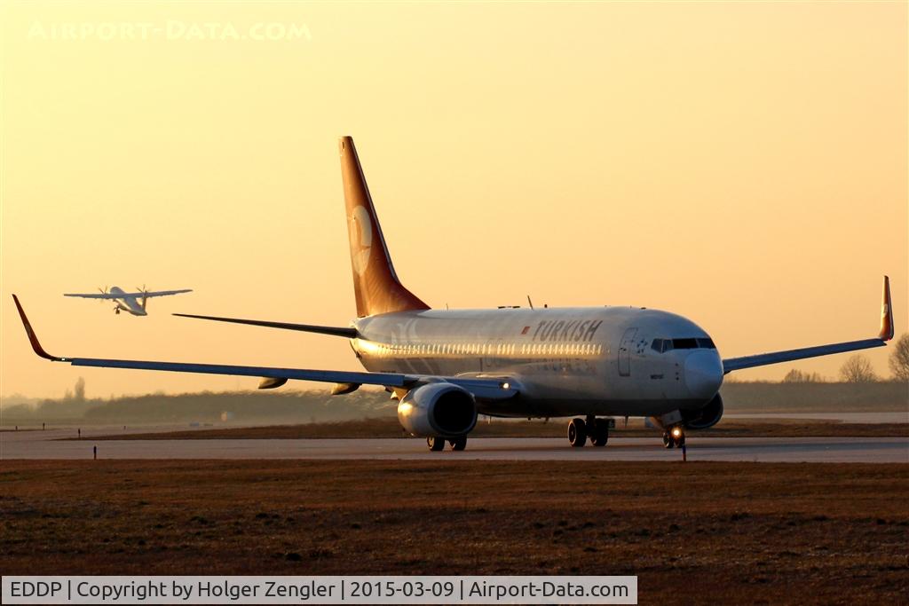 Leipzig/Halle Airport, Leipzig/Halle Germany (EDDP) - IST shuttle on taxi for departure via twy Alpha while Ethihad Regional  just has left rwy 26R in straight direction for CDG....
