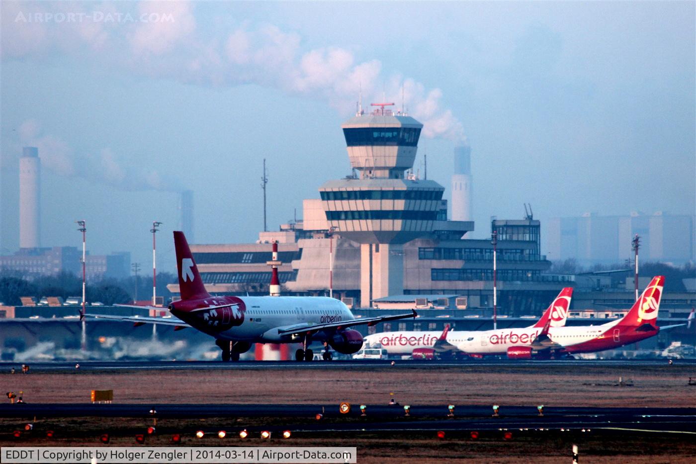 Tegel International Airport (closing in 2011), Berlin Germany (EDDT) - Running aircraft on rwy 26L, apron and tower in beautiful morning sun...