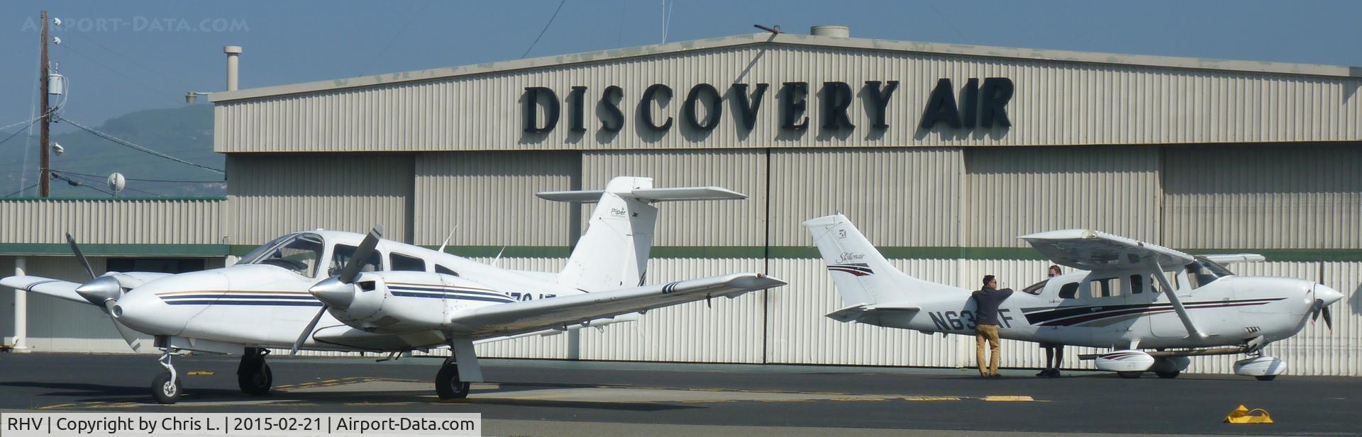 Reid-hillview Of Santa Clara County Airport (RHV) - The Discovery Air hangar with one of Nice Air's Piper Seneca's and Discovery Air's Cessna 206s.