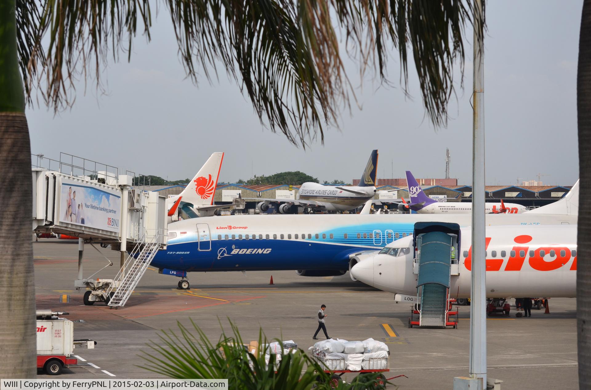 Soekarno-Hatta International Airport, Cengkareng, Banten (near Jakarta) Indonesia (WIII) - View from the waving gallery at CGK over a part of the Lion Air terminal 1A.