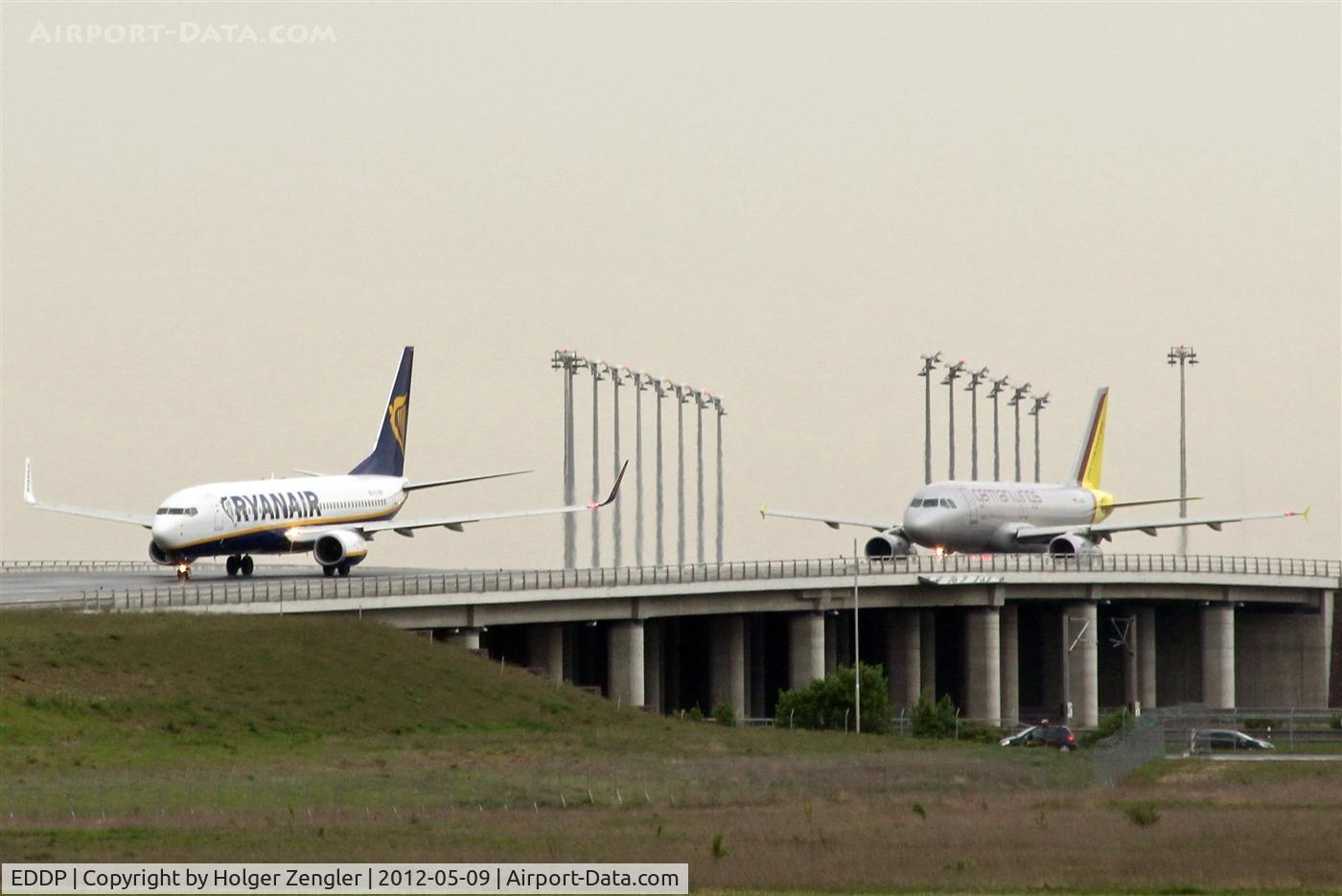 Leipzig/Halle Airport, Leipzig/Halle Germany (EDDP) - Outbound traffic on eastern rolling bridge over Autobahn 14, expecting take off on rwy 26R....