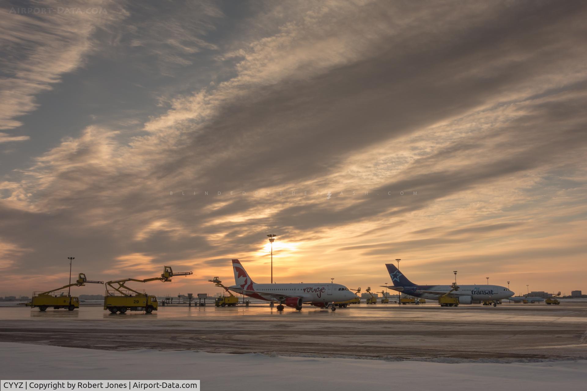Toronto Pearson International Airport (Toronto/Lester B. Pearson International Airport, Pearson Airport), Toronto, Ontario Canada (CYYZ) - Sunrise de-icing at Toronto Pearson