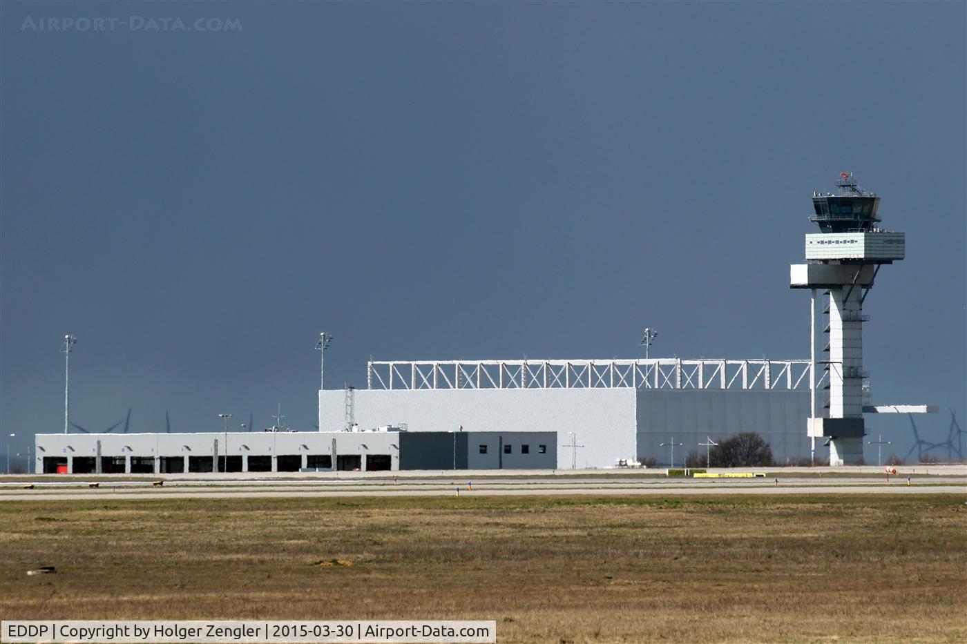 Leipzig/Halle Airport, Leipzig/Halle Germany (EDDP) - In front fire station east and in the back AN-124 hangar at apron 3 and tower (view from a hill at DHL fuel station).....