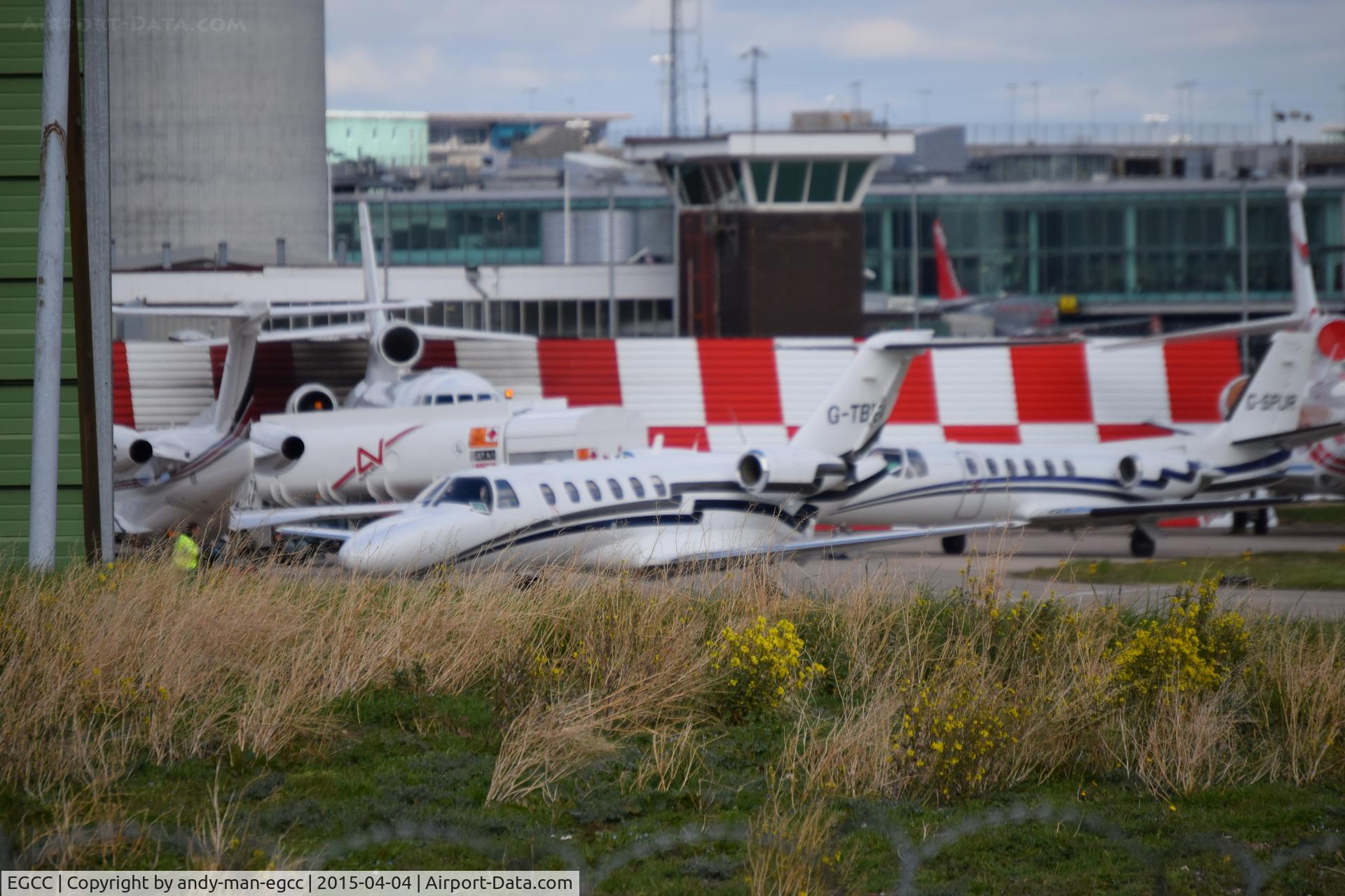 Manchester Airport, Manchester, England United Kingdom (EGCC) - on the landmark exc ramp are

G-TBEA G-SPUR PH-AJX N512TF

photo taken from the [AVP]