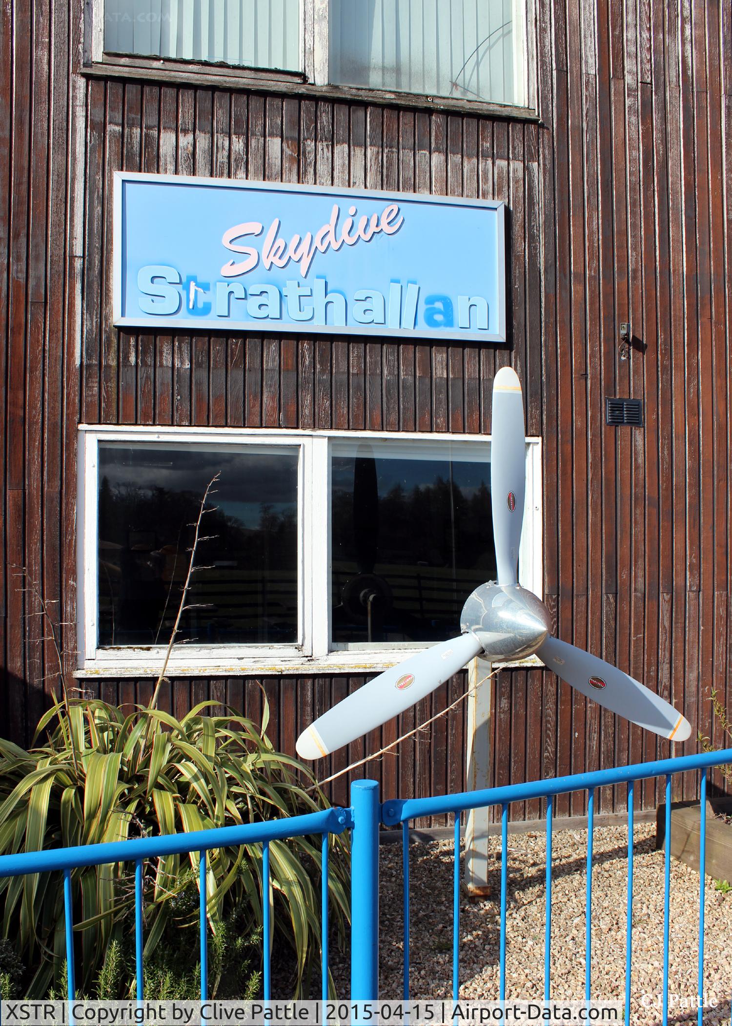 XSTR Airport - A close up of the main entrance to the offices of Skydive Scotland at Strathallan Airfield, XSTR, near Auchterarder, Perthshire, Scotland, with a suitable display item.