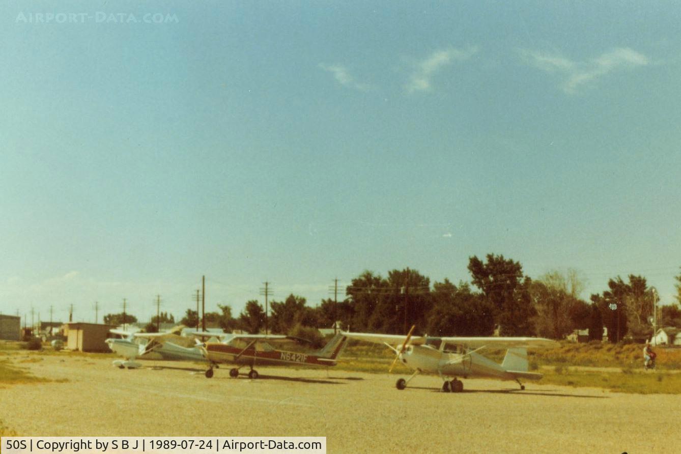 Parma Airport (50S) - A stop for gas at Parma with help of a bicycle and a can.Seen on the right side of picture.A short ride to town.