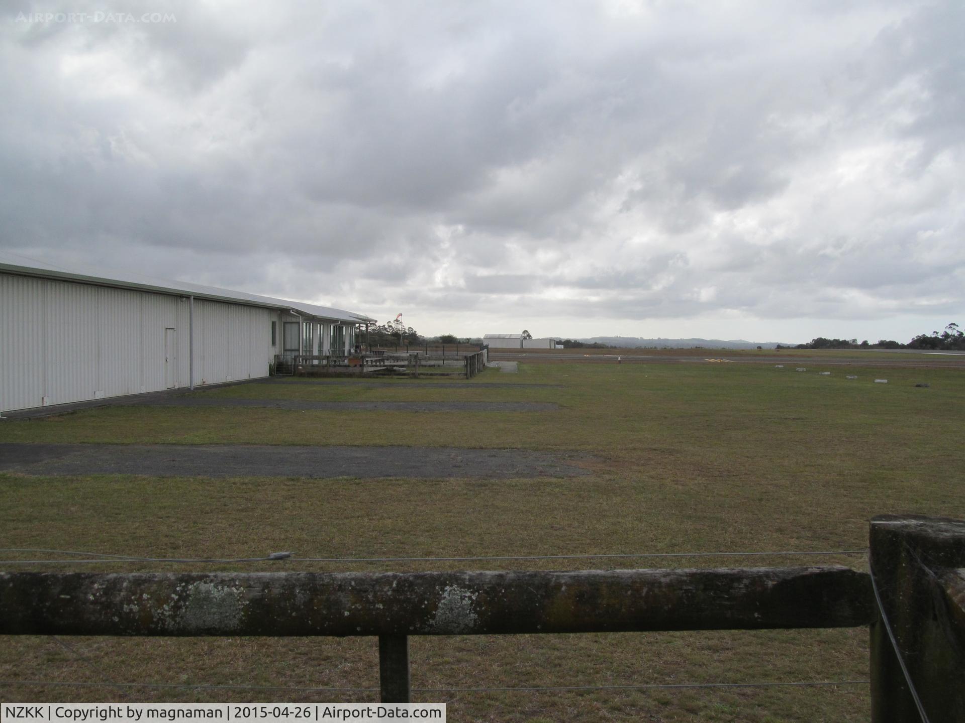 Kerikeri/Bay of Islands Airport, Kerikeri / Bay of Islands New Zealand (NZKK) - View of local hangar and terminal outdoor area. This airfield is most common first or last stop for light aircraft being imported or exported by air from new Zealand.