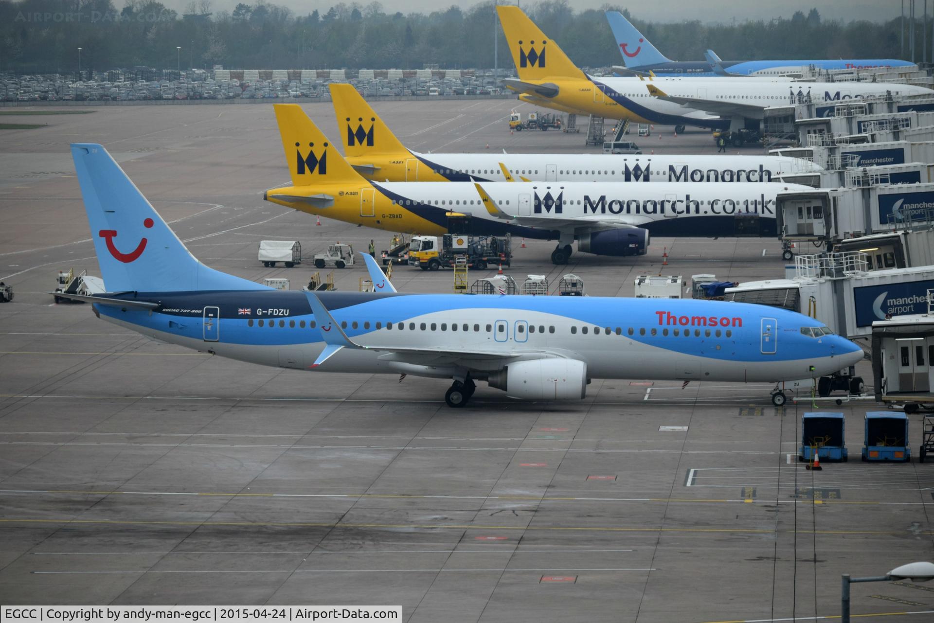 Manchester Airport, Manchester, England United Kingdom (EGCC) - TOM and MON parked up on T2 waiting for there pax 