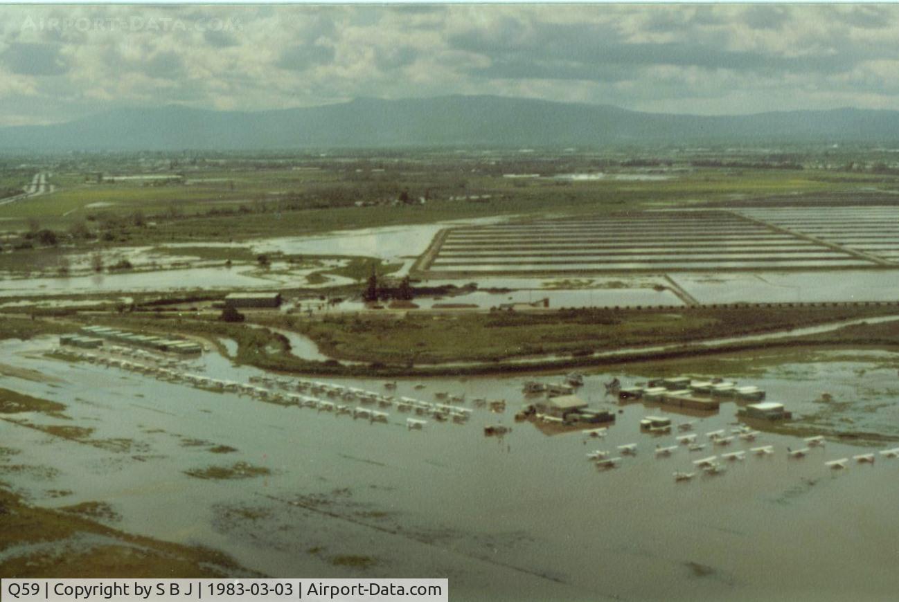 Q59 Airport - Fremont airport in Calif. did flood from time to time when Mother Nature was overly generous.South end planes (left) were OK but north end was 3-4 feet deep. Not so good. View is to the SW.