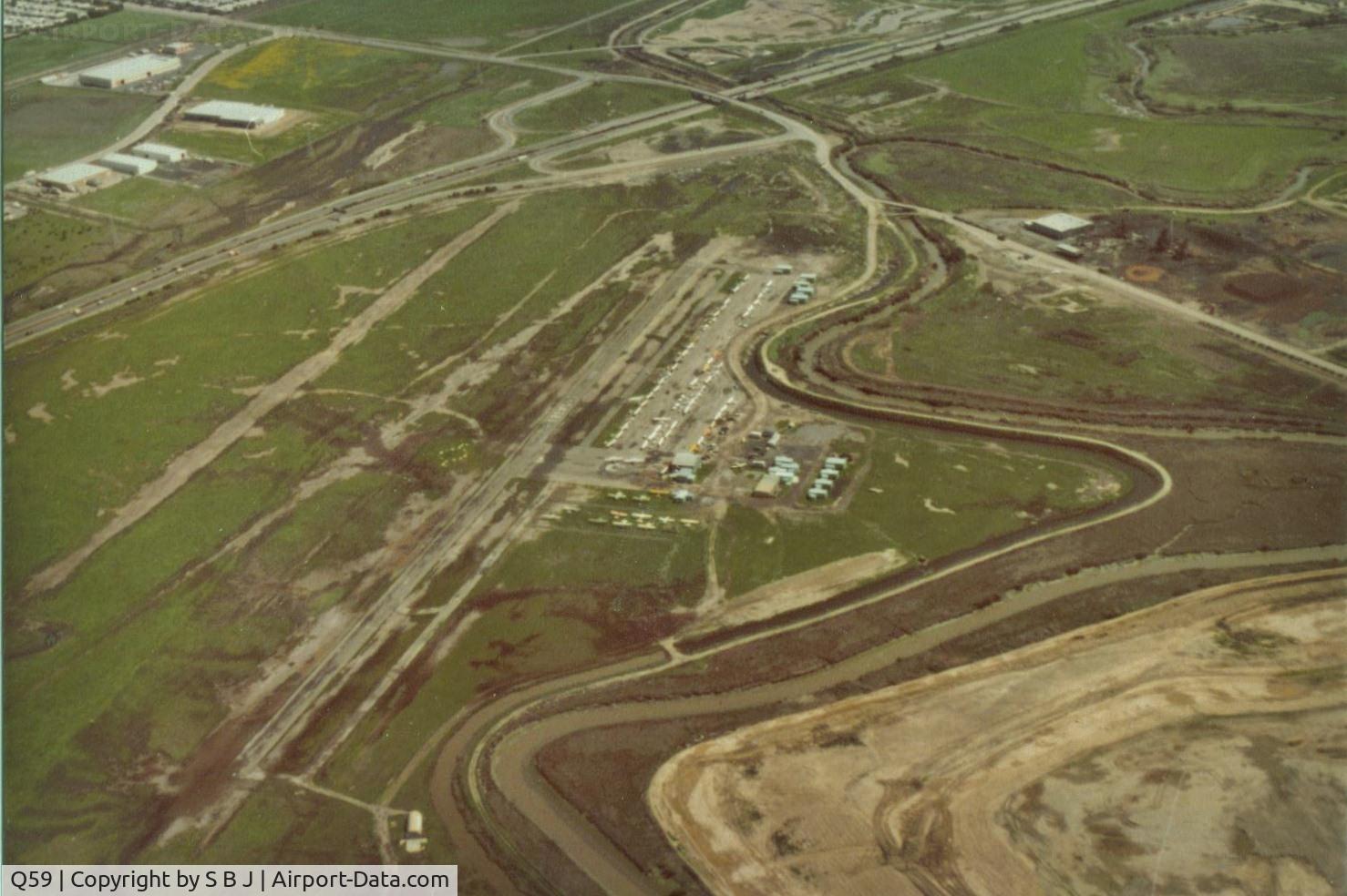 Q59 Airport - Fremont airport,Calif. which closed in 1986 was a very busy little airport,so it is surprising that it lasted only about 20 years.This picture was taken around 1980. View is SE.Last non tower airport in the SF Bay Area as Sky Sailing was a private airport