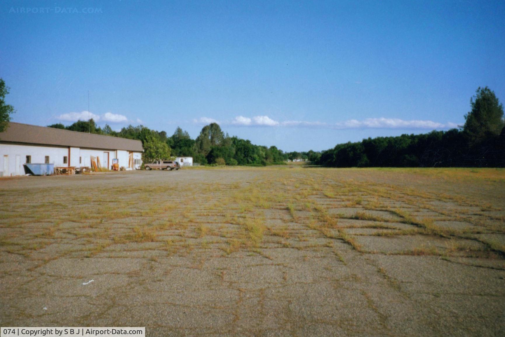 074 Airport - Redding Sky Ranch in Redding,Calif.Was a small friendly airport with a somewhat challenging (C170 Accident 7-13-74) runway,with trees on both sides and a trailer park at the very end.Was satisfying when you made a good approach and landing.View is South.
