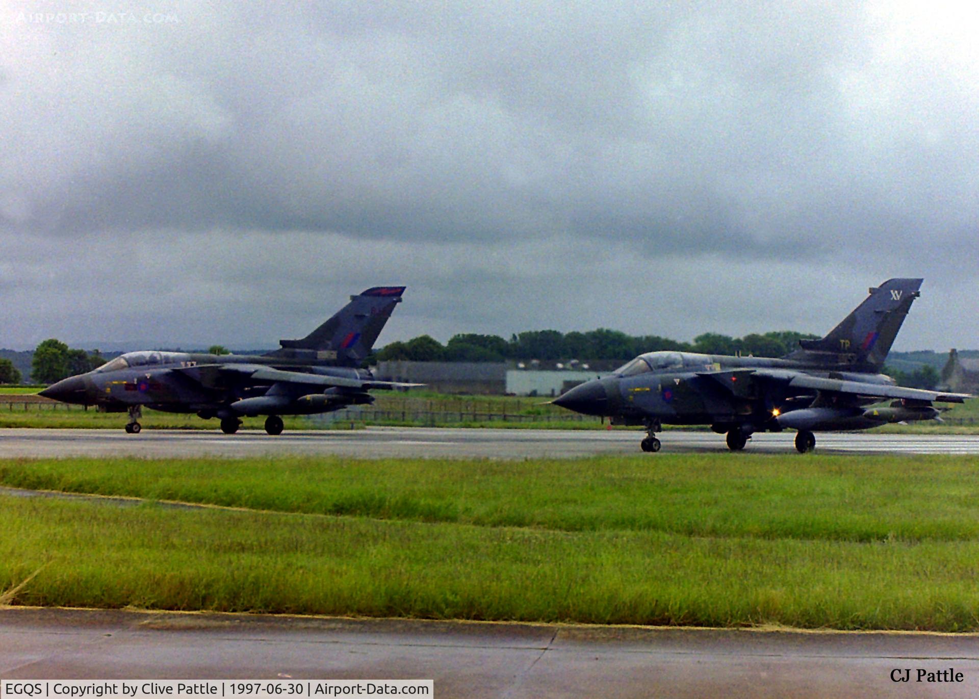 RAF Lossiemouth Airport, Lossiemouth, Scotland United Kingdom (EGQS) - A pair of Tornado GR.1's lined up for take off at RAF Lossiemouth EGQS. On the left is a 617 Sqn and on the right a 15 R Sqn machine.