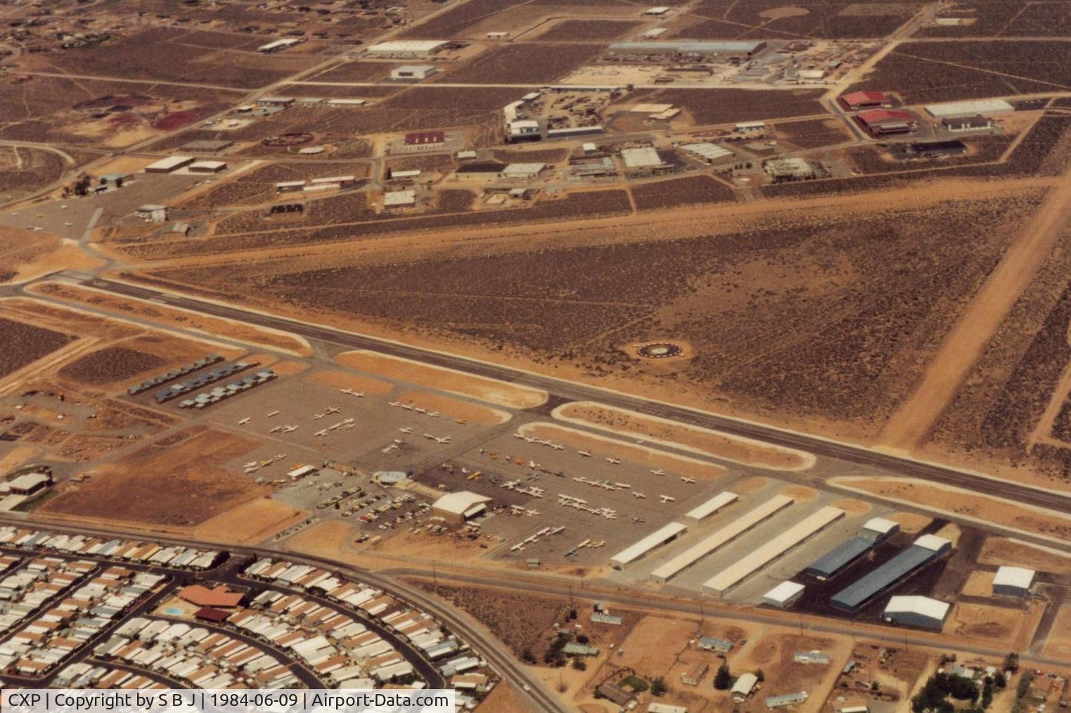 Carson Airport (CXP) - On downwind at Carson City and arriving during a mini air show in 1984.Small plane on taxi way after takeoff did a 180 and a low level pass (at us) as we were on short final.Another memorable landing at CXP.