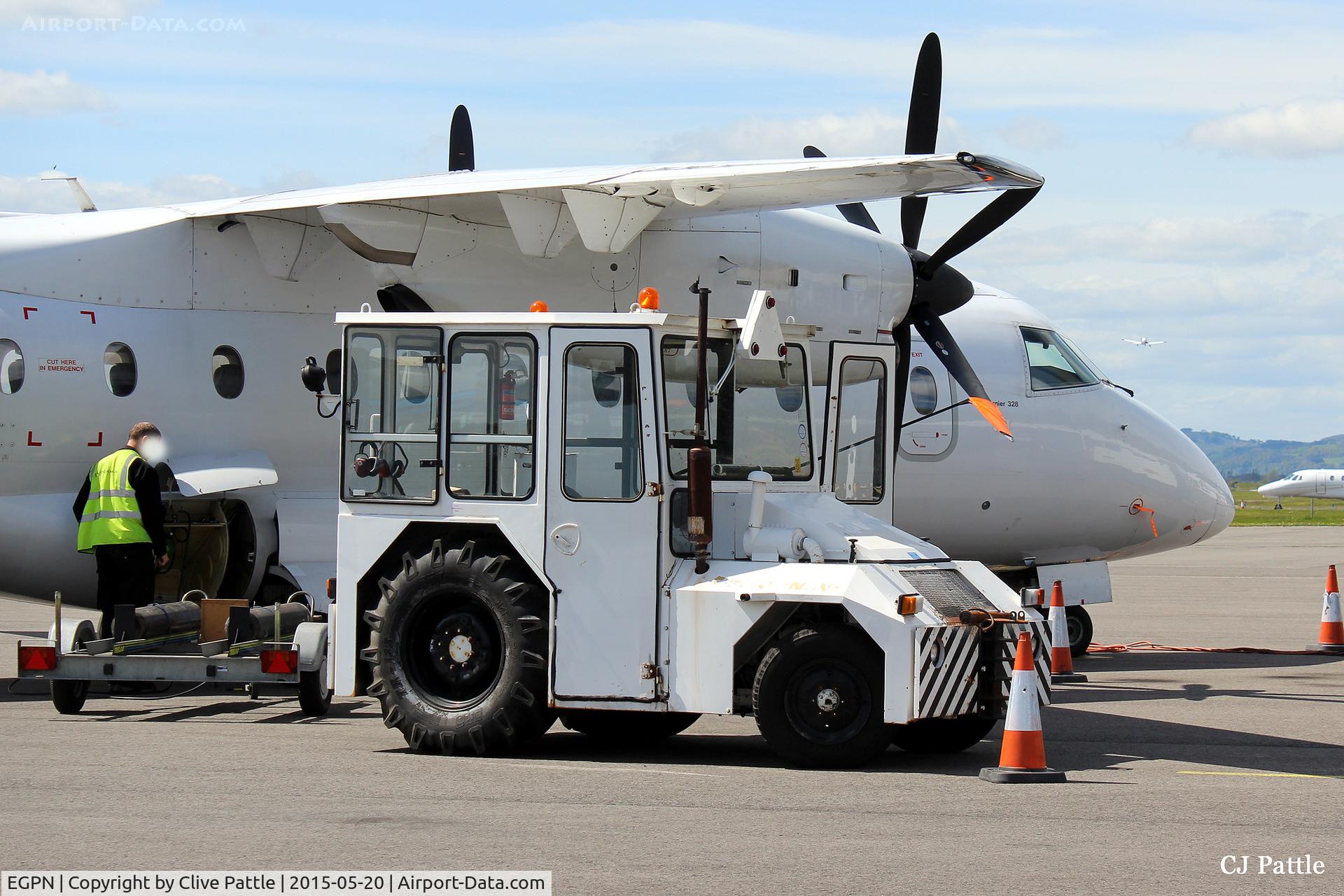 Dundee Airport, Dundee, Scotland United Kingdom (EGPN) - Loading baggage operations at Dundee Riverside EGPN