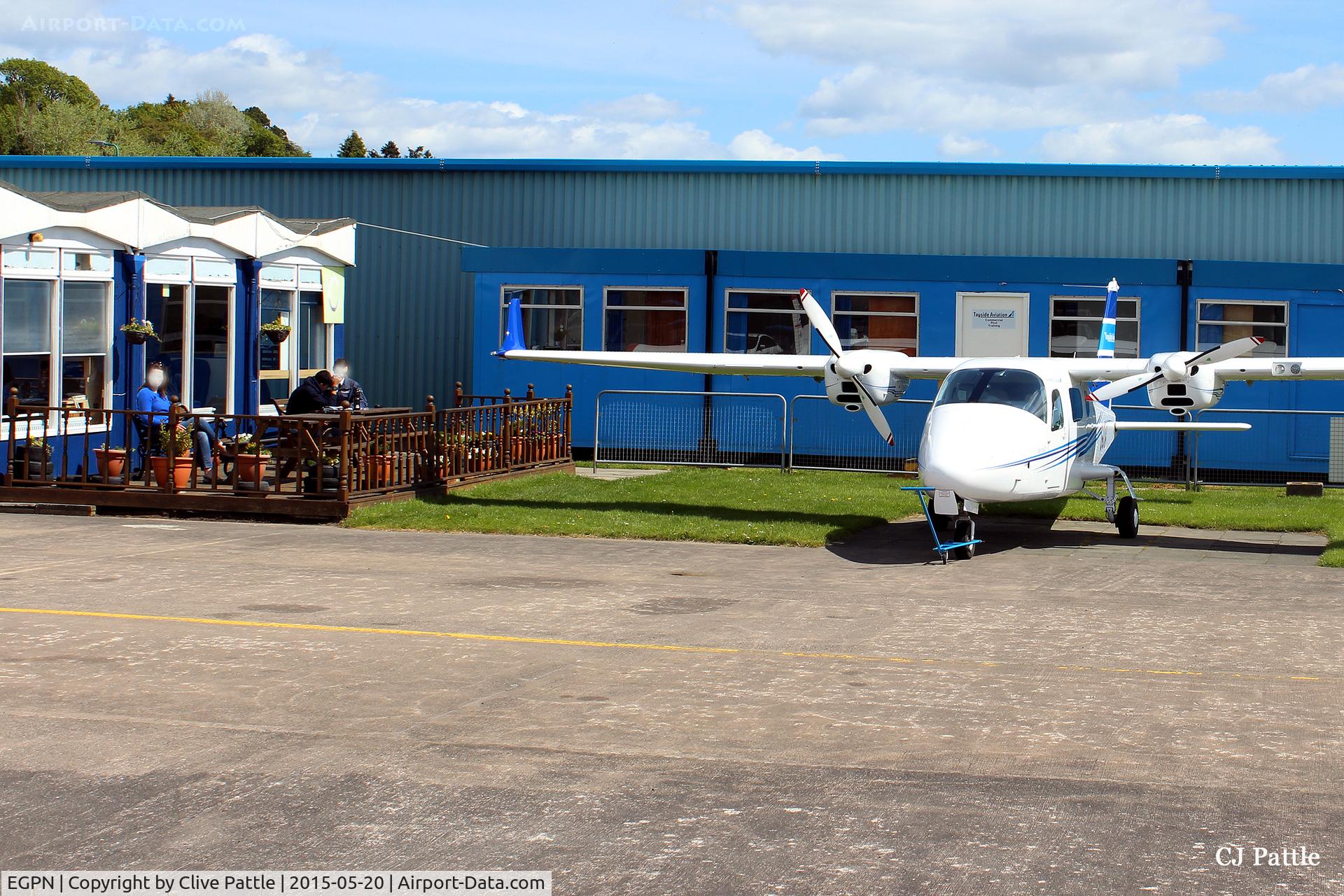 Dundee Airport, Dundee, Scotland United Kingdom (EGPN) - Another view of the Tayside Aviation facilities at Dundee Riverside airport (EGPN). The parked aircraft is a (fairly) new addition to the Flying Schools fleet, G-OTAY.