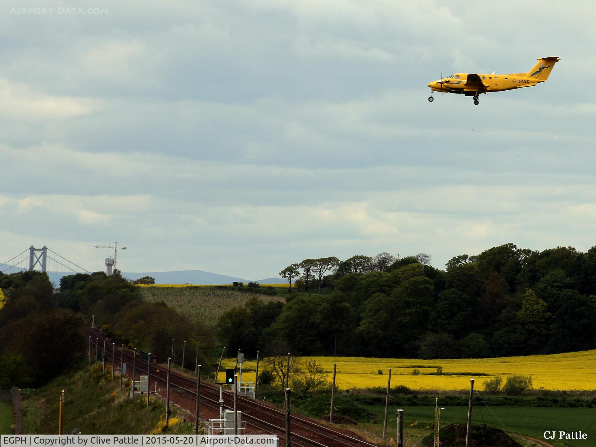 Edinburgh Airport, Edinburgh, Scotland United Kingdom (EGPH) - One of the two Beech King Airs operated by the Scottish Ambulance Service (G-SASC) on finals to Edinburgh EGPH. Note the Forth Road Bridge in the background.
