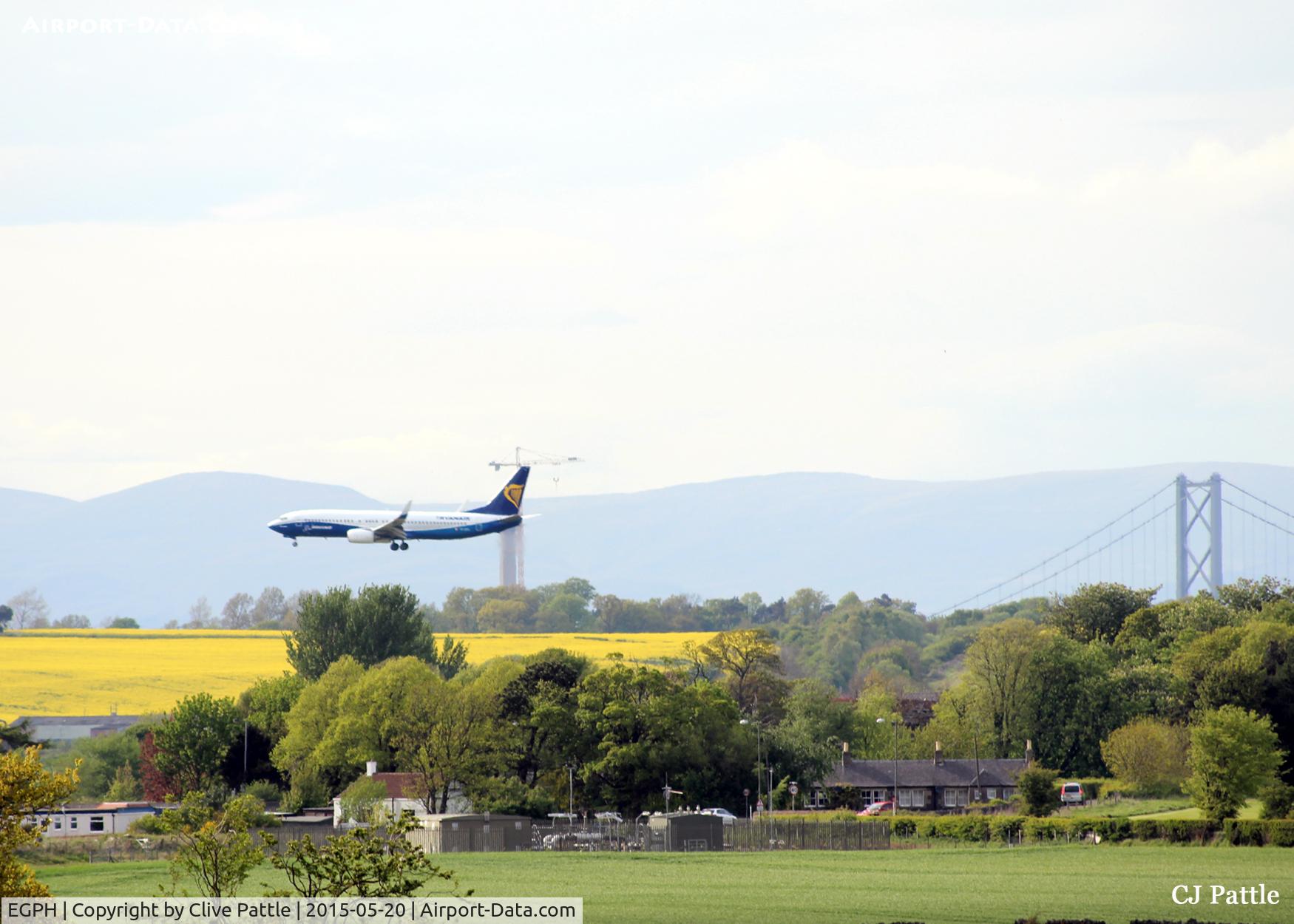 Edinburgh Airport, Edinburgh, Scotland United Kingdom (EGPH) - Filmed from afar, a Ryanair B738, sporting the 'Boeing' colour scheme, is on finals to land at Edinburgh EGPH