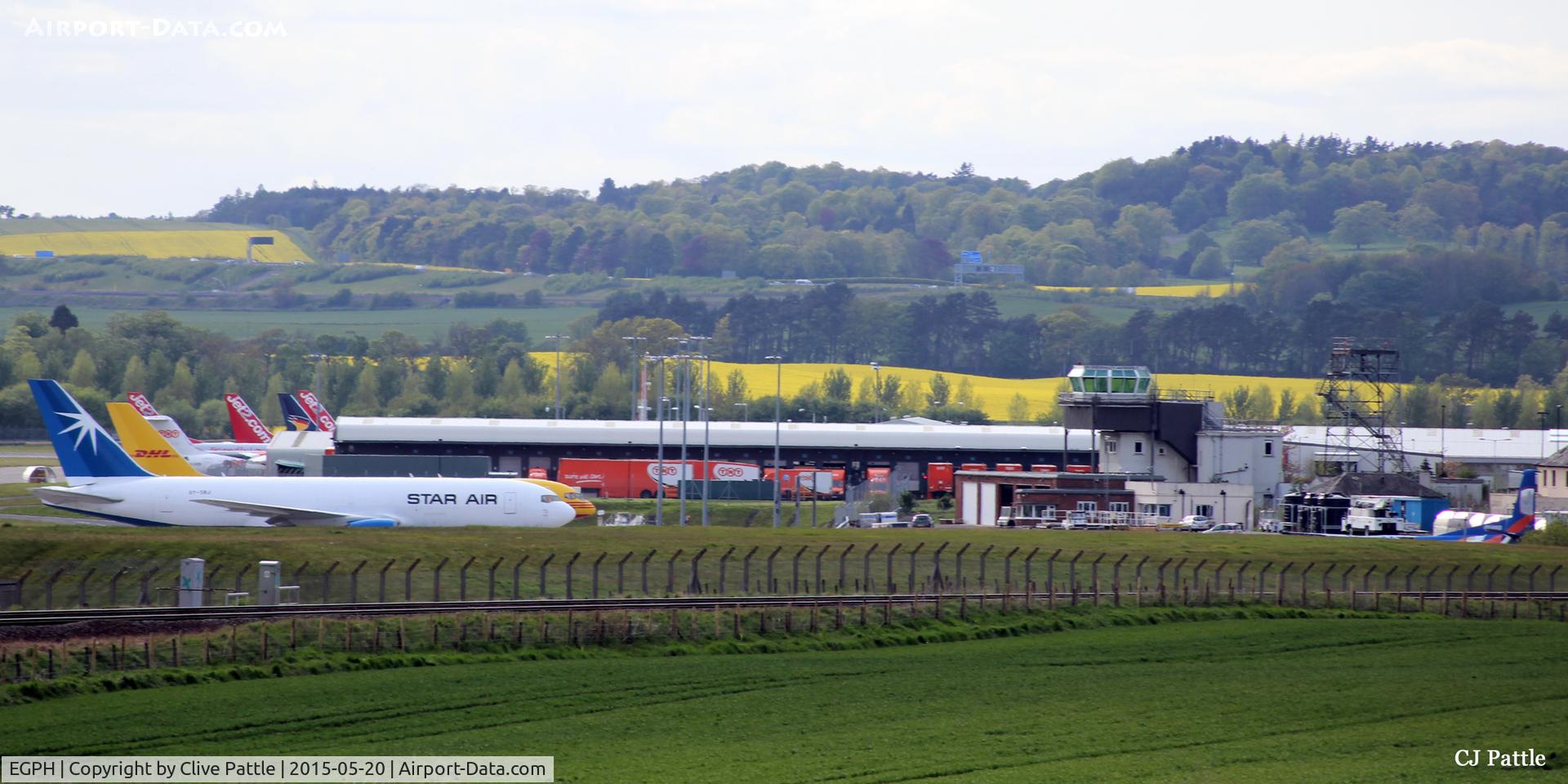 Edinburgh Airport, Edinburgh, Scotland United Kingdom (EGPH) - The cargo area on the north side at Edinburgh EGPH. To the right is the old ATC tower and the area once operated by the Royal Air Force as 'RAF Turnhouse'.