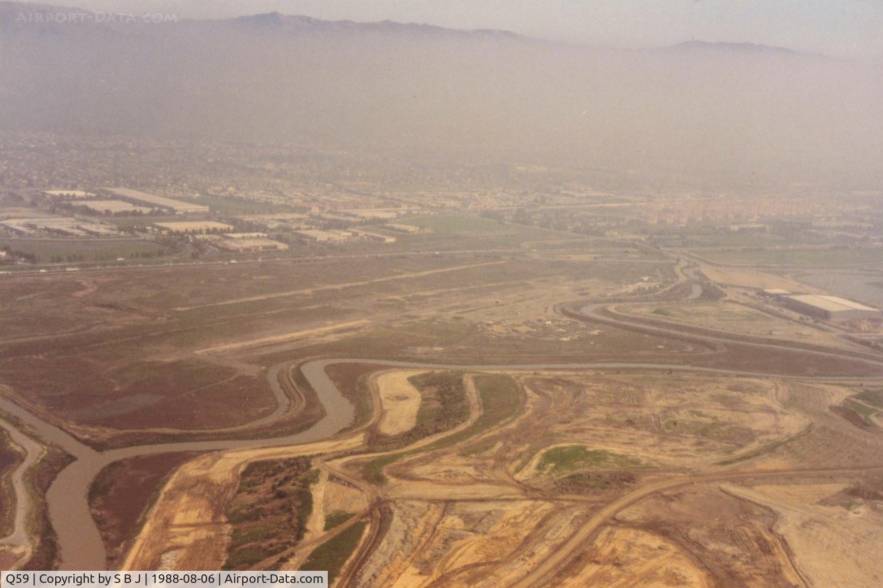Q59 Airport - Fremont,Ca closed in 1986.Most pilots who flew out of Fremont and there were many, will find this picture a familiar sight. It is on the 45 entry to runway 31 and over the landfill. Over the dumps, was an often heard unicom call.View is to the east.