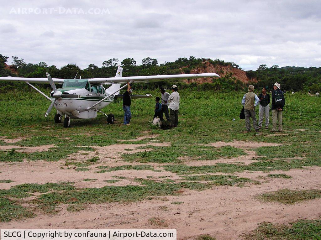 SLCG Airport - Charagua airstrip, Cessna 206 CP-1895 taking researchers to overfly Kaa Iya del Gran Chaco Nat Park, Santa Cruz, Bolivia ca.2006