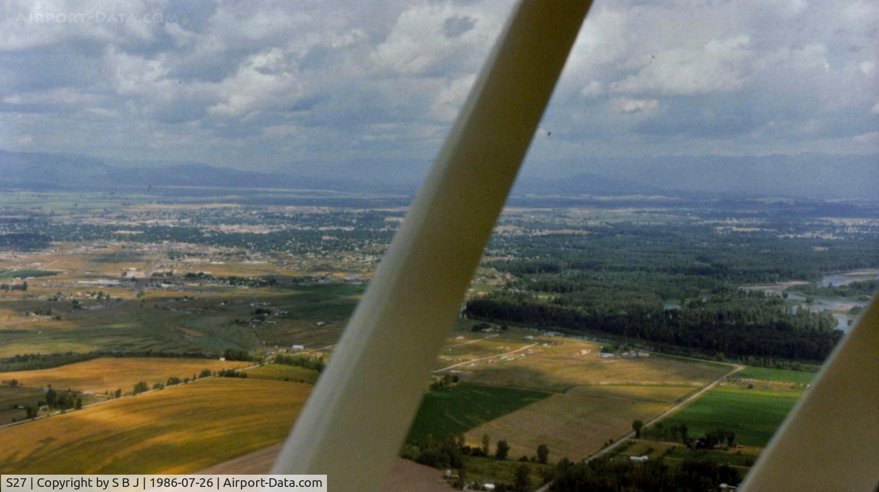 Kalispell City Airport (S27) - Kalispell airport is seen on the far left and middle of picture.The Flathead River is on the right and with the view to the north and not far from Glacier Park Intl. airport..