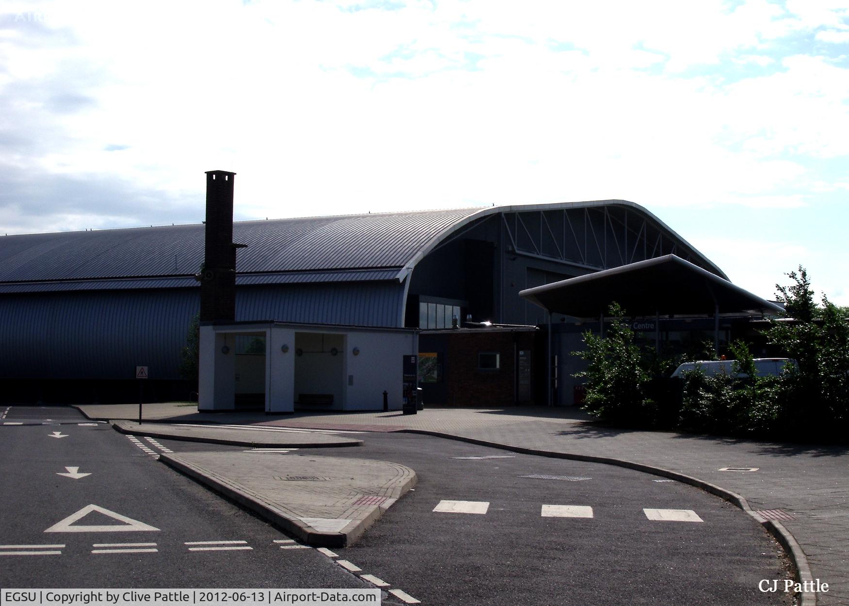 Duxford Airport, Cambridge, England United Kingdom (EGSU) - The main visitor arrival hall at the IWM Duxford with the 'Airspace' hangar beyond.