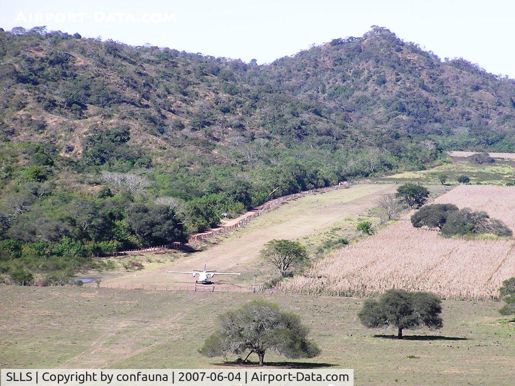 SLLS Airport - Lagunillas airstrip (-19.81 -63.66), at the former Hacienda Caraparicito (now Guarani Indigenous Territory), with a Let410 parked in the northern end