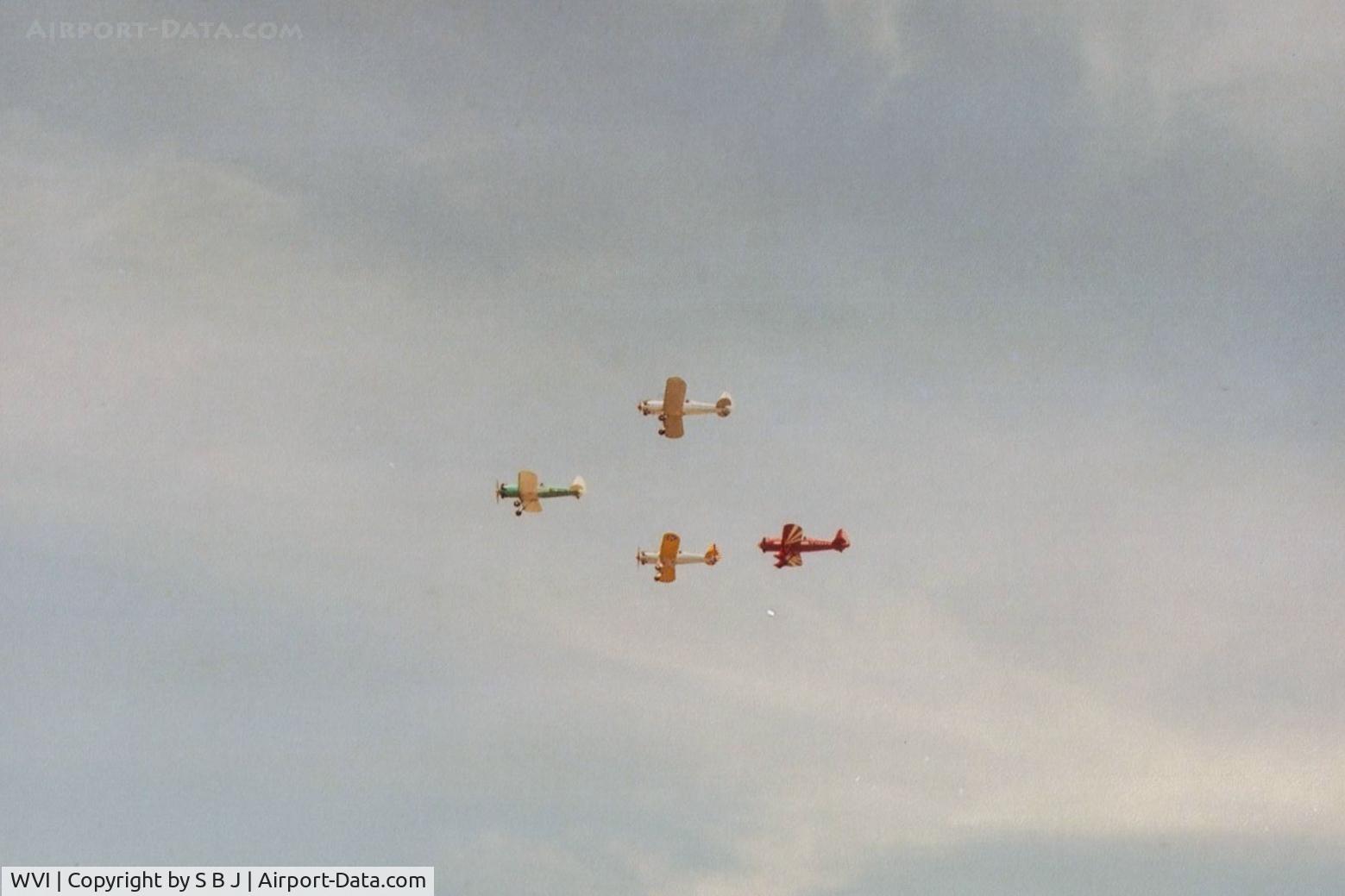Watsonville Municipal Airport (WVI) - PT 22s doing a fly by (and doing a nice job of it) at the Watsonville airshow.Notice red PT lower to advoid wake of green PT and have better visibility.Always admired good flying.