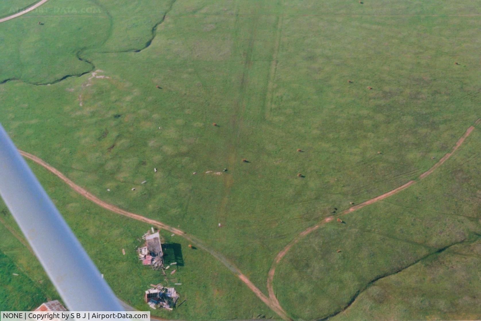 NONE Airport - The Orvis Ranch is a large cattle ranch in the Calif foothills near Hy 4.The owner was an avid pilot in the 50s & 60s till he passed on.Had a twin Beech in one hangar and a PA18 in the other.Were still nice when I flew over in the 70s.