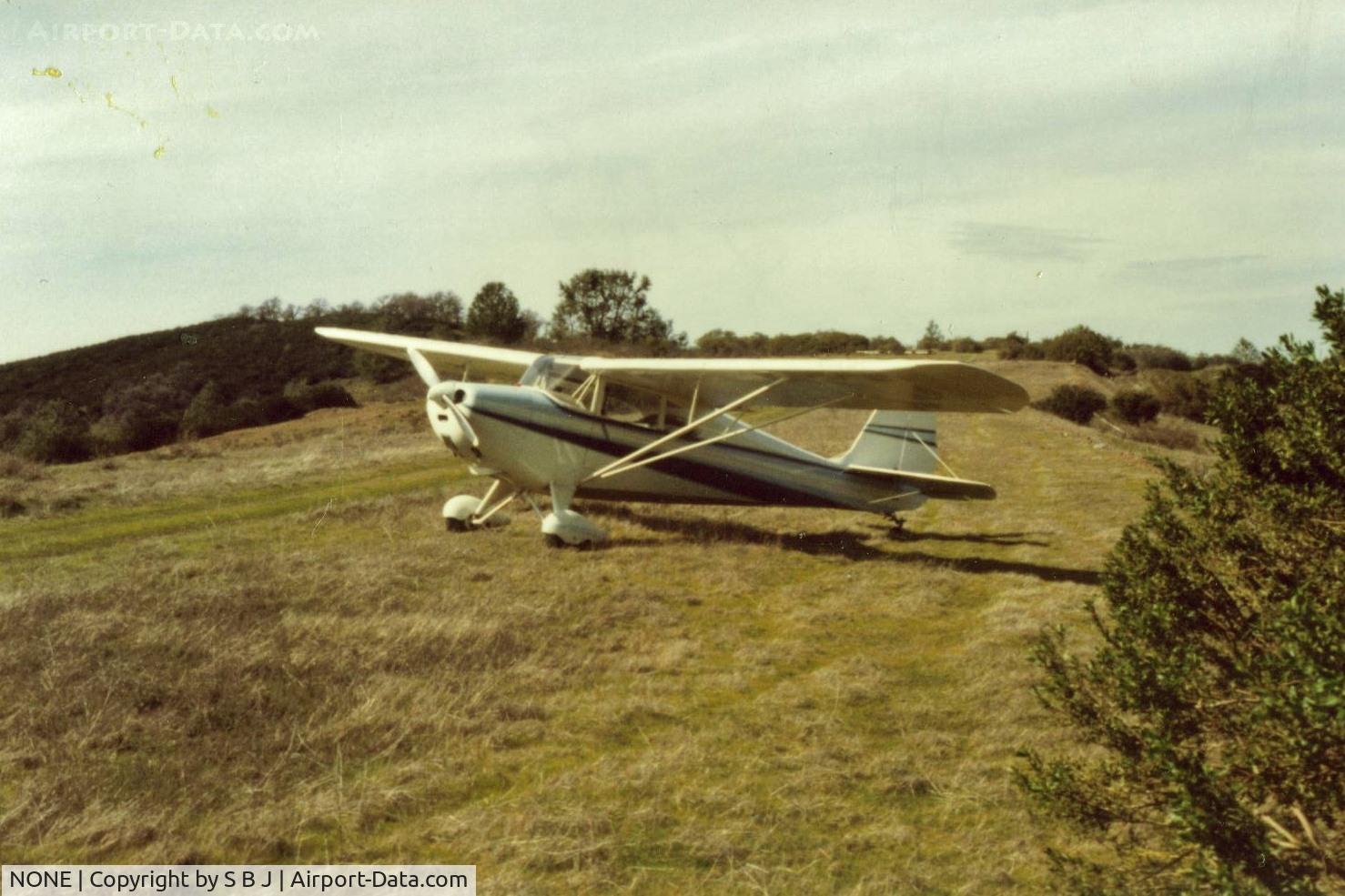 NONE Airport - 78E at a ranch strip in the Diablo Range near Mt Hamilton in 1987.Landed there several times till land was given to Calif. to add to an existing state park thus closing the strip.Was a long,wide nice dirt runway.Built for large planes or maybe poor pilots