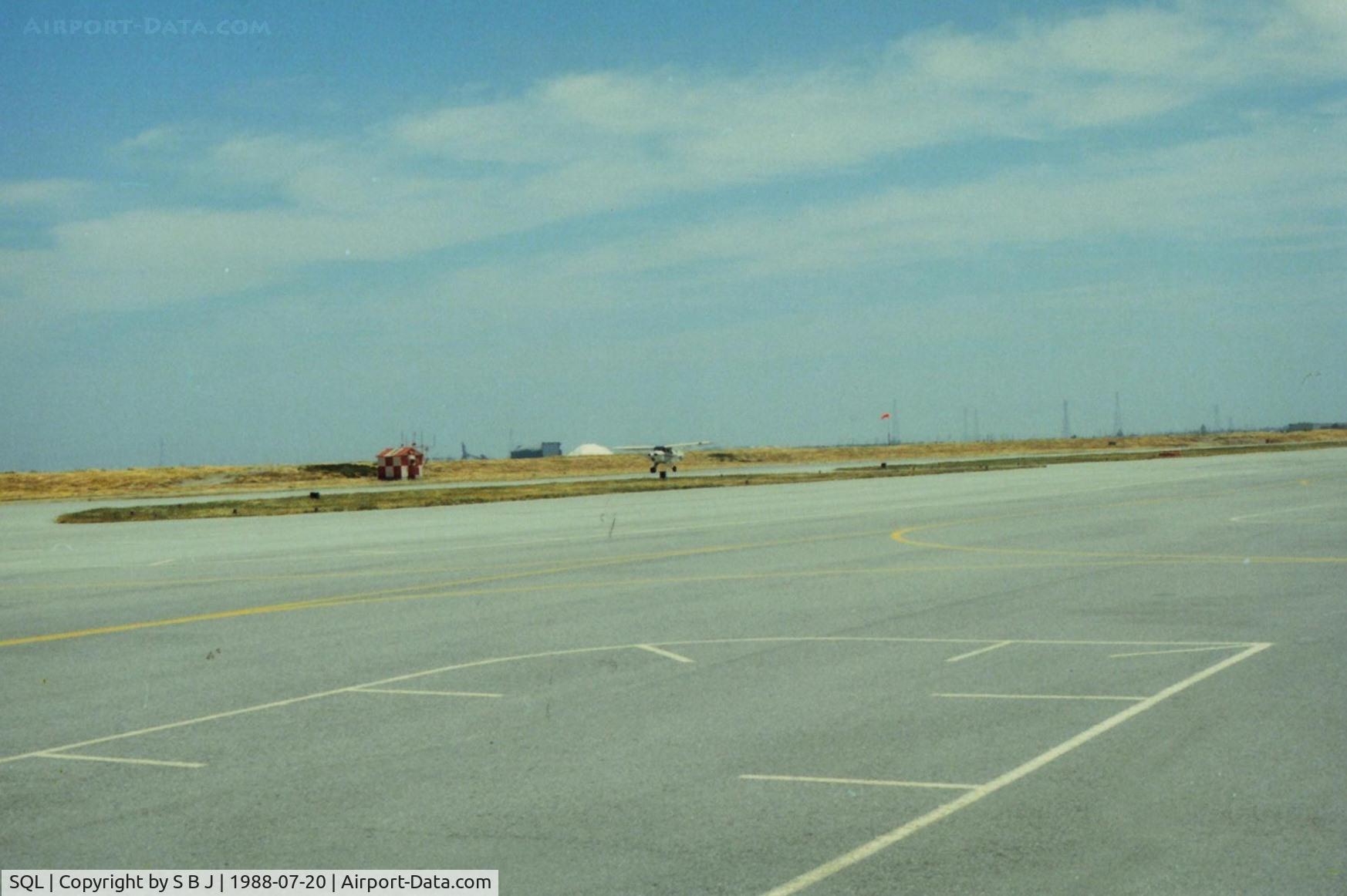 San Carlos Airport (SQL) - TriPacer 71P seen as it begins its takeoff from runway 30. On the left of 71P is a salt pile which helped in poor vis. and next to it is the  historic Howard Hughes Mining Barge I. It was in the Redwood City harbor in the mid 80s.View SE.