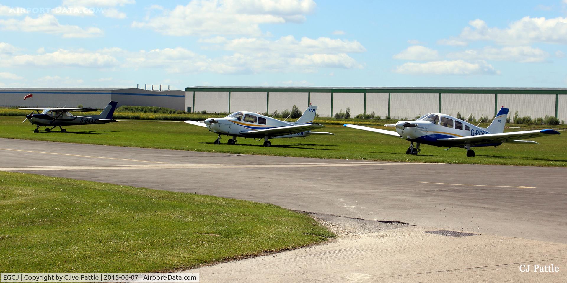 Sherburn-in-Elmet Airfield Airport, Sherburn-in-Elmet, England United Kingdom (EGCJ) - A line-up of based aircraft at Sherburn