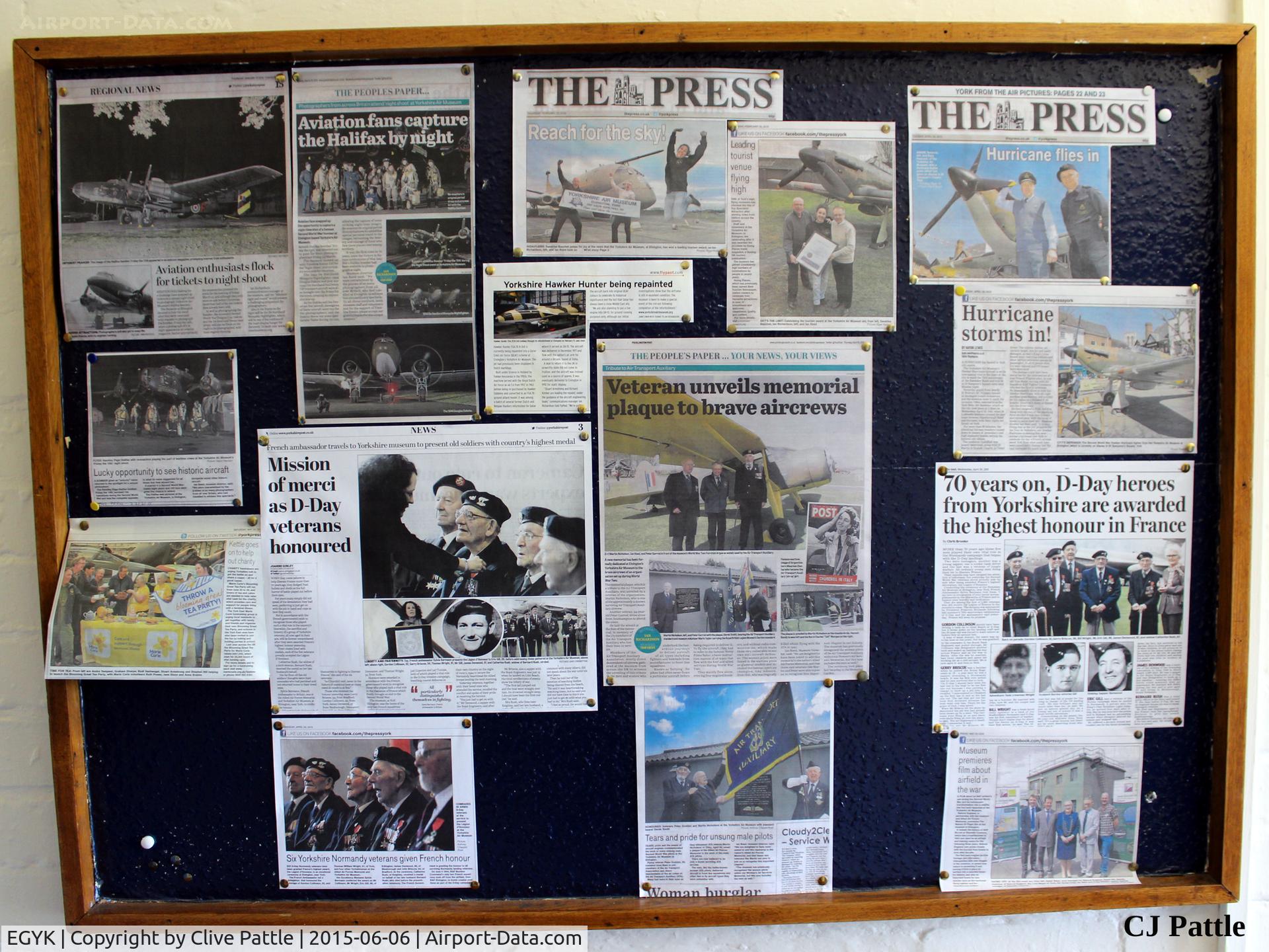 EGYK Airport - A noticeboard with Press Clippings for articles relating to the Yorkshire Air Museum, showing real people involved in the airfields history.
