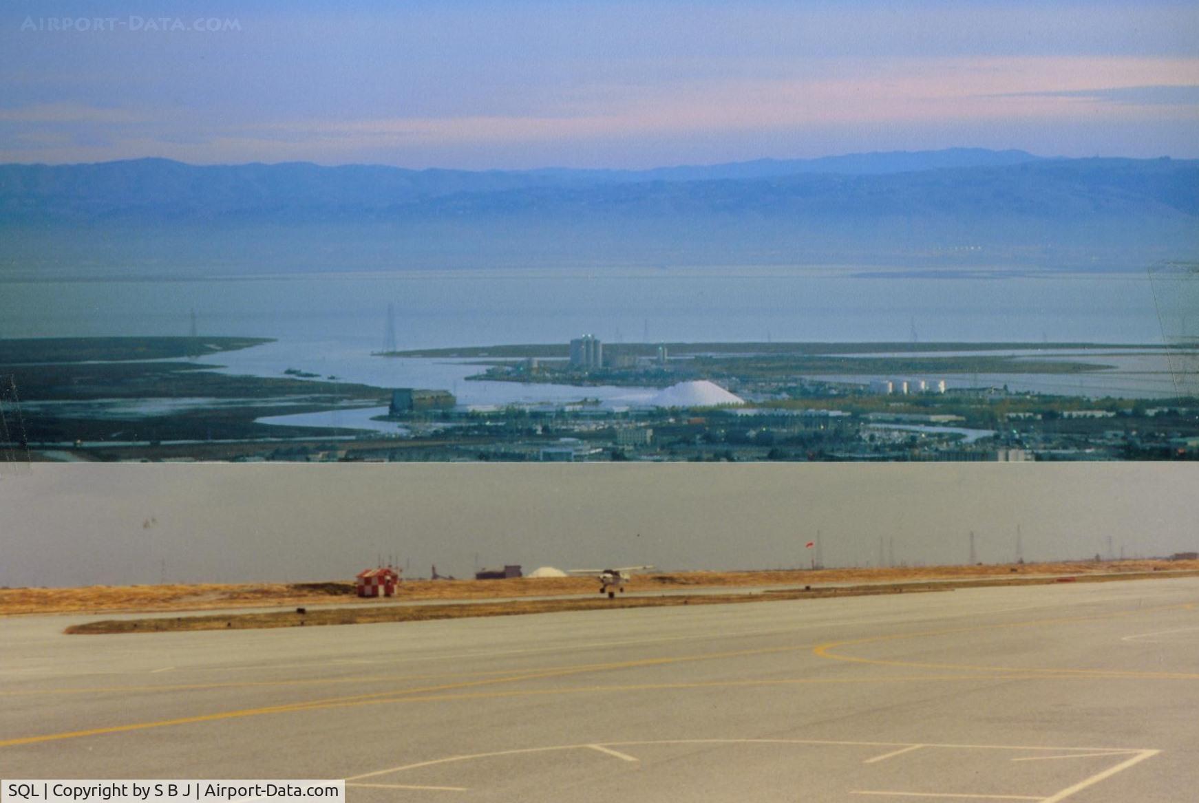 San Carlos Airport (SQL) - Top picture is view to the east and the main reporting point when flying in from that direction, which is the cement plant . I reported over it many times.This pic also shows the amazing Howard Hughes Mining Barge I which was there in the mid 80s.
