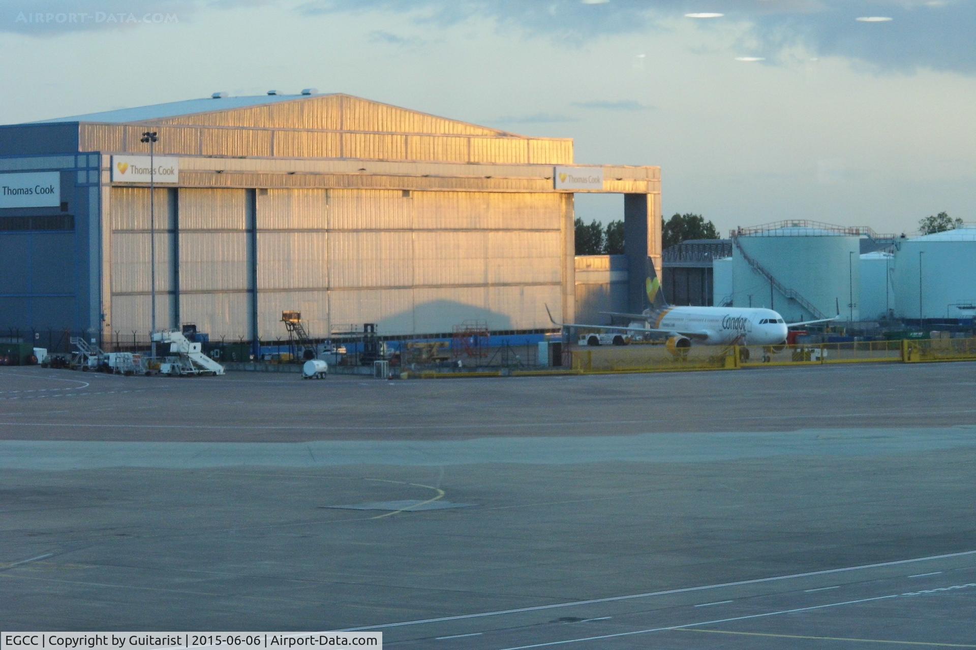 Manchester Airport, Manchester, England United Kingdom (EGCC) - As the sun goes down over Manchester