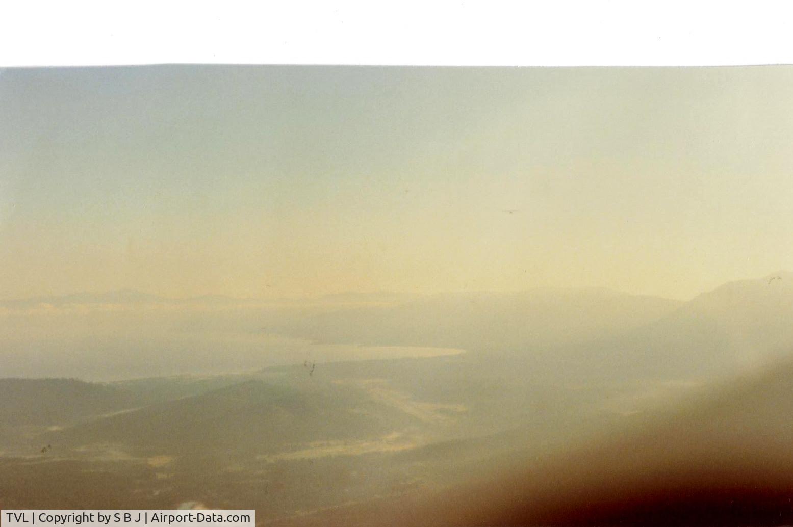 Lake Tahoe Airport (TVL) - This picture (as poor as it is)will give you some idea why pilots get in serious trouble departing TVL.A stright out or left crosswind puts you in high terrain that many planes cannot outclimb.This has led to many fatal accidents.