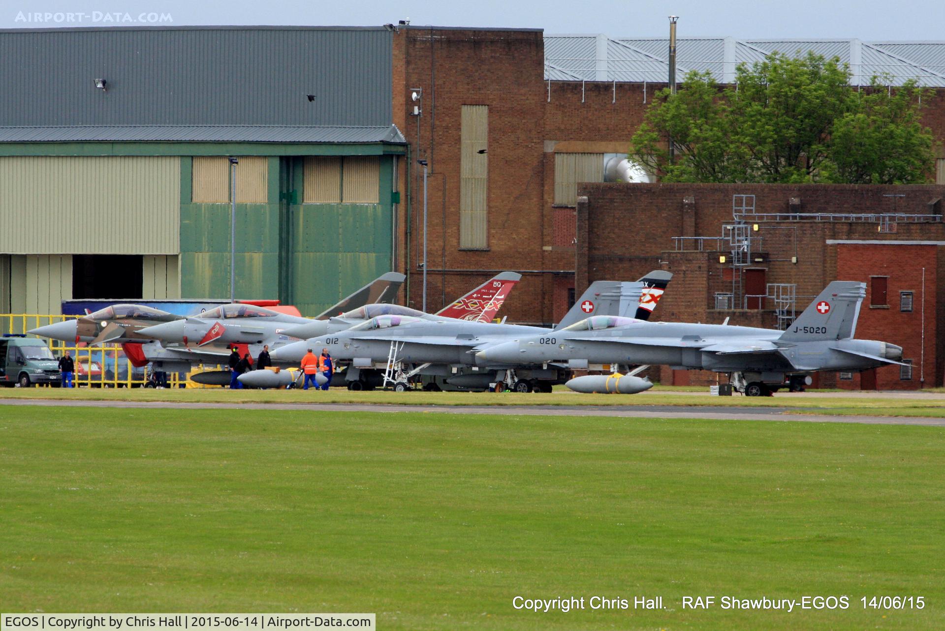 RAF Shawbury Airport, Shawbury, England United Kingdom (EGOS) - three RAF Typhoon's and two Swiss AF F-18 Hornets at RAF Shawbury before their displays at the Cosford Airshow