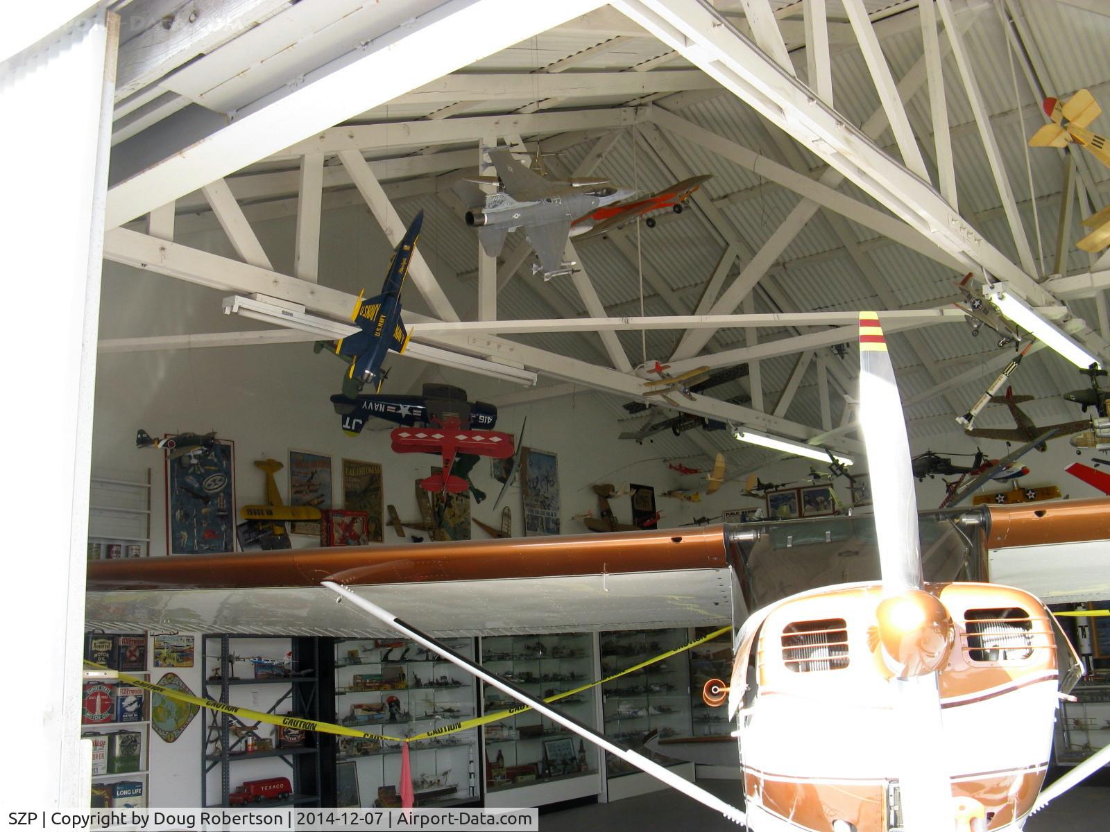 Santa Paula Airport (SZP) - 12 CURTISS TAXI, huge collection of model aircraft, including donation collections from Naval Aviators. This hangar open First Sundays with absolutely countless aircraft models on display.